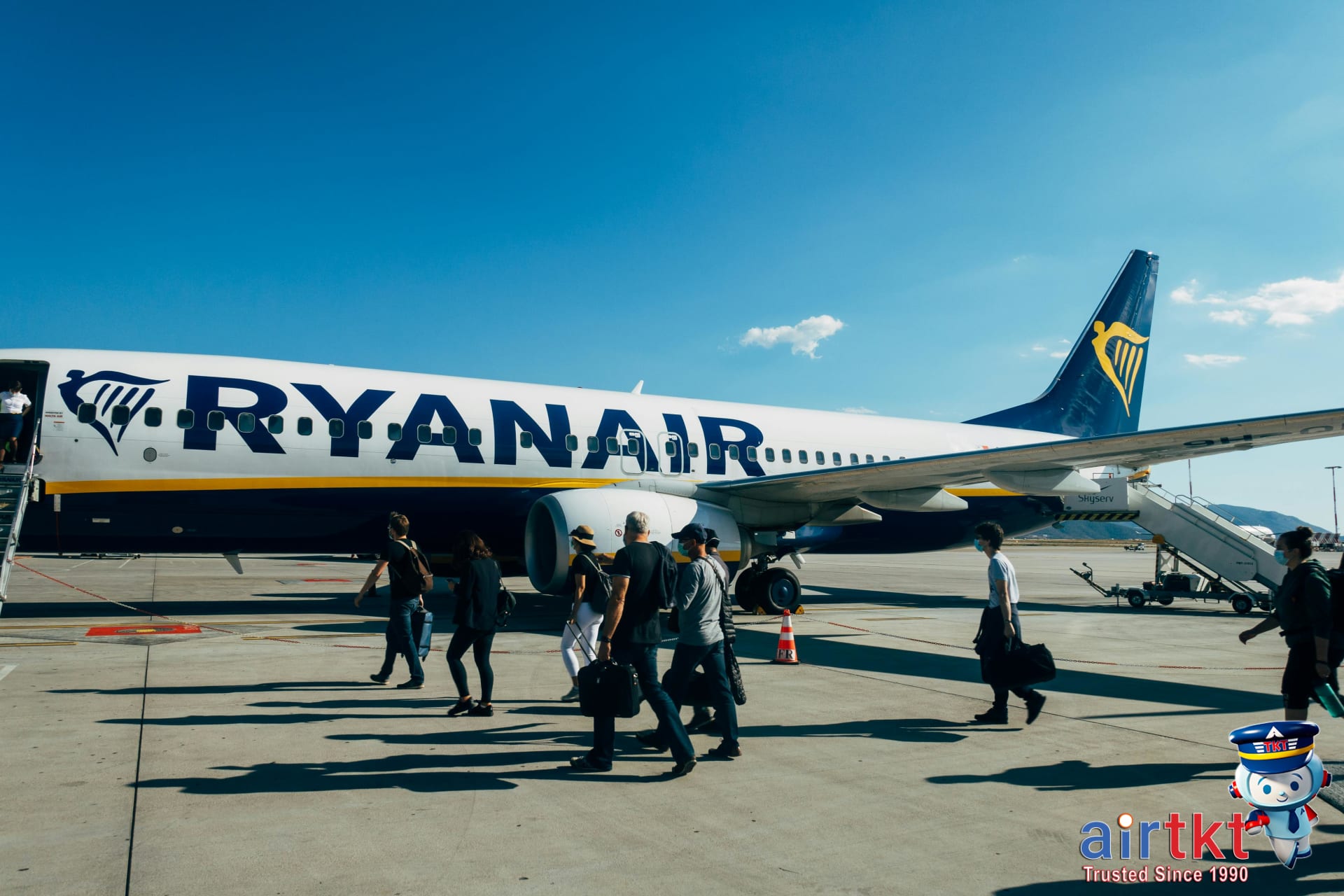 Traveler booking cheap Asia flights using smartphone app with user-friendly tools