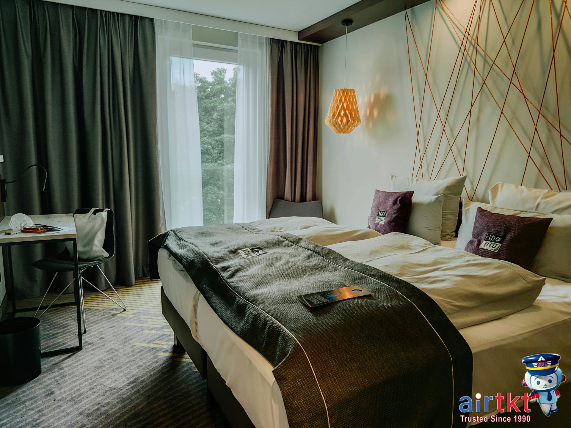 Hotel room with blackout curtains for better sleep and jet lag