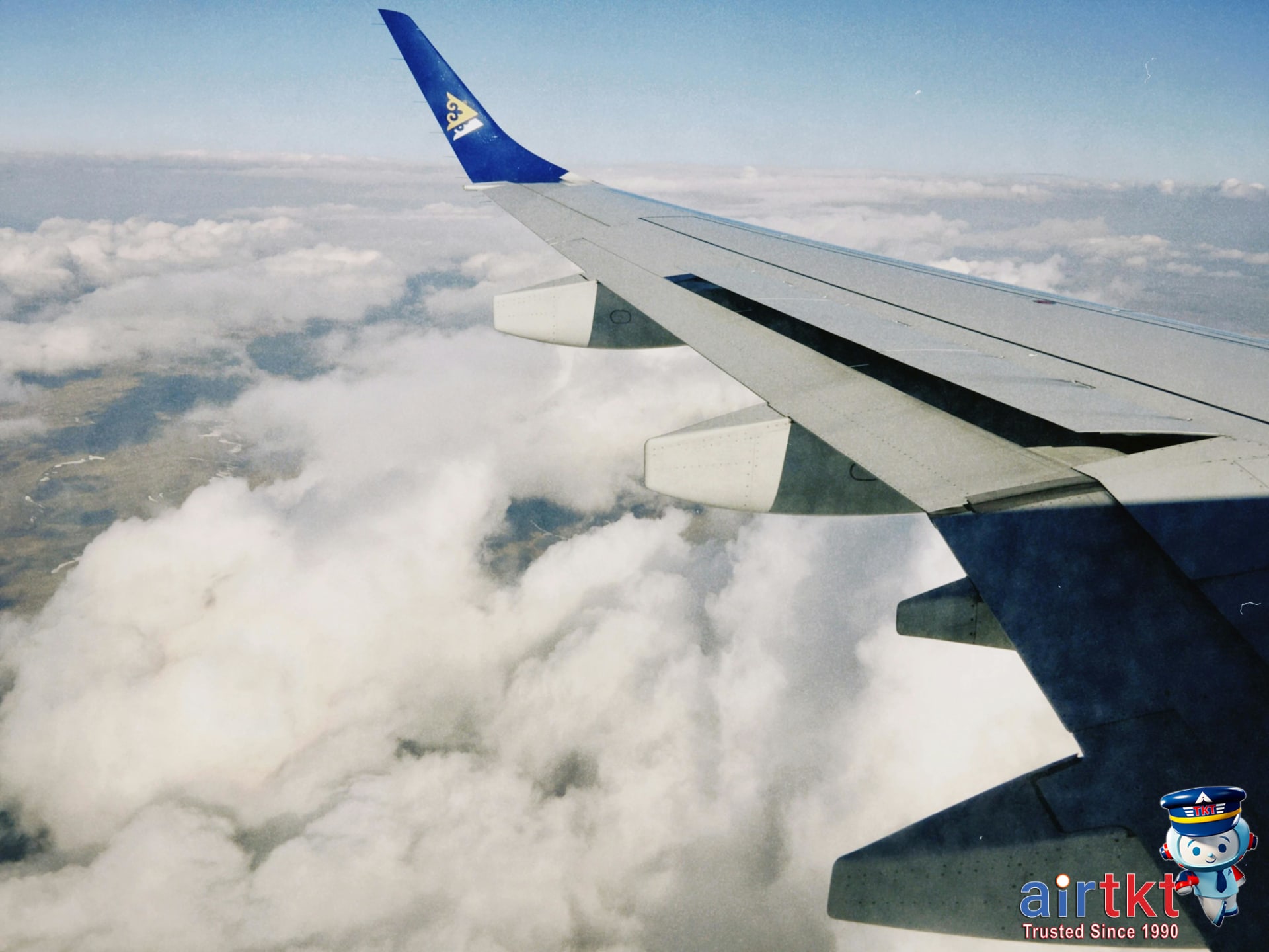 Long-haul flight airplane above clouds confronting jet lag effects in travelers