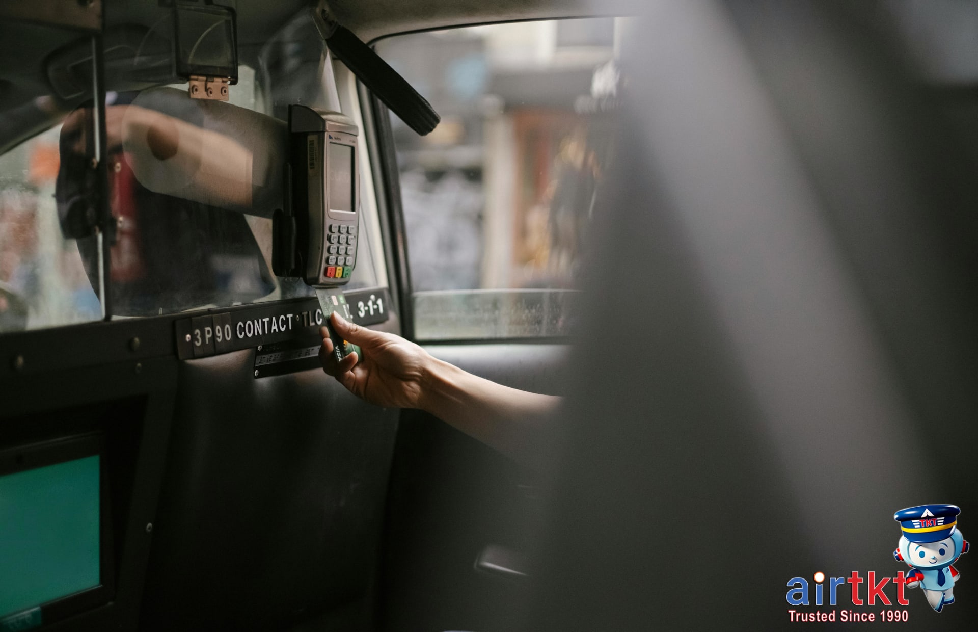 Traveler using contactless payment on London Tube for first-time visitors
