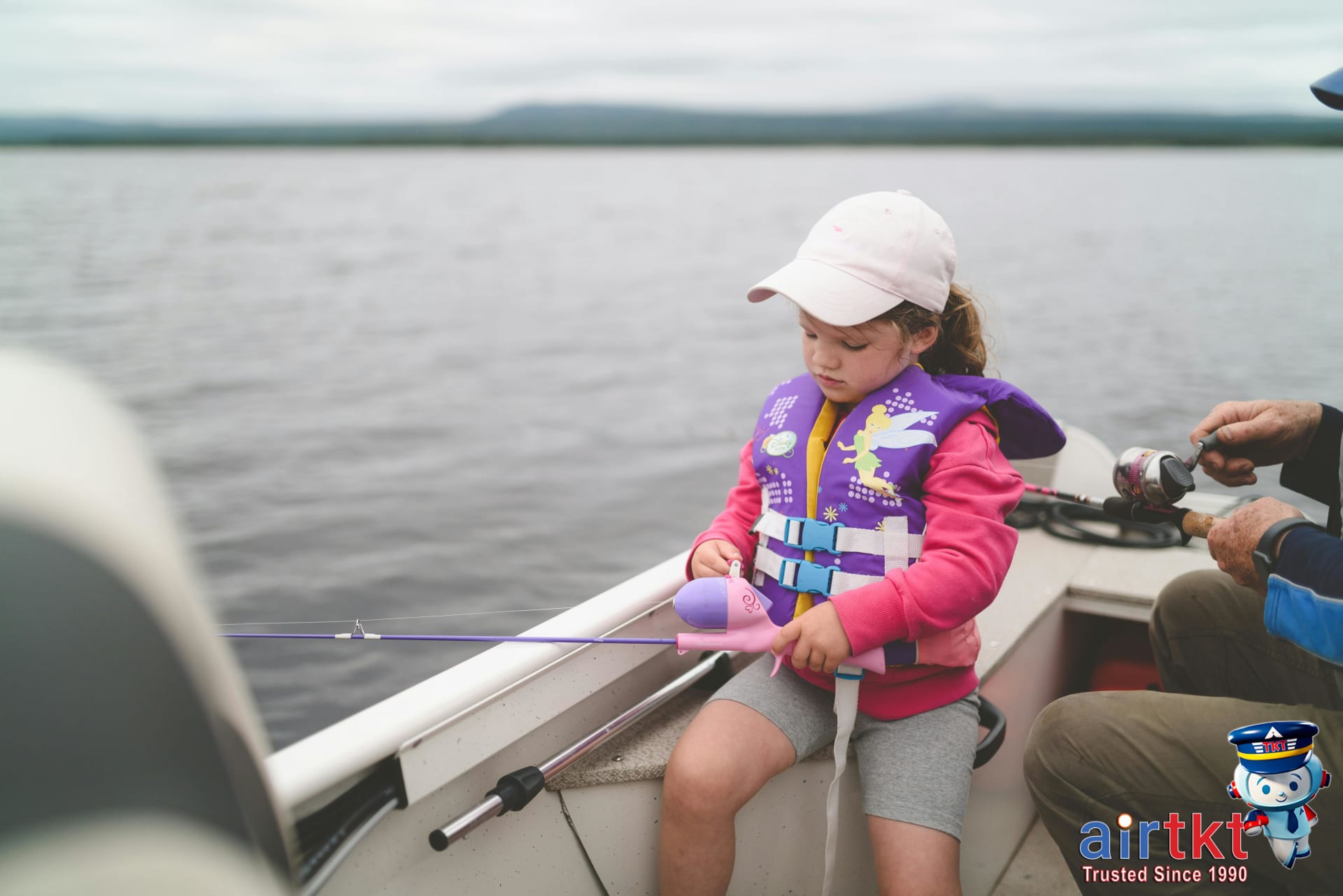 Family enjoying boating activities during Victoria Day long weekend in Canadian lakes