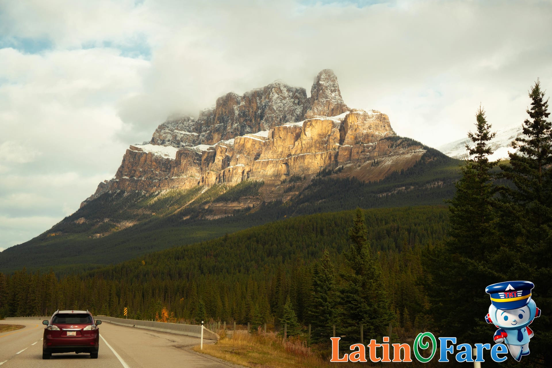 Car on scenic Banff parkway for Canadian Rockies transport, seasonal travel and packing guide.