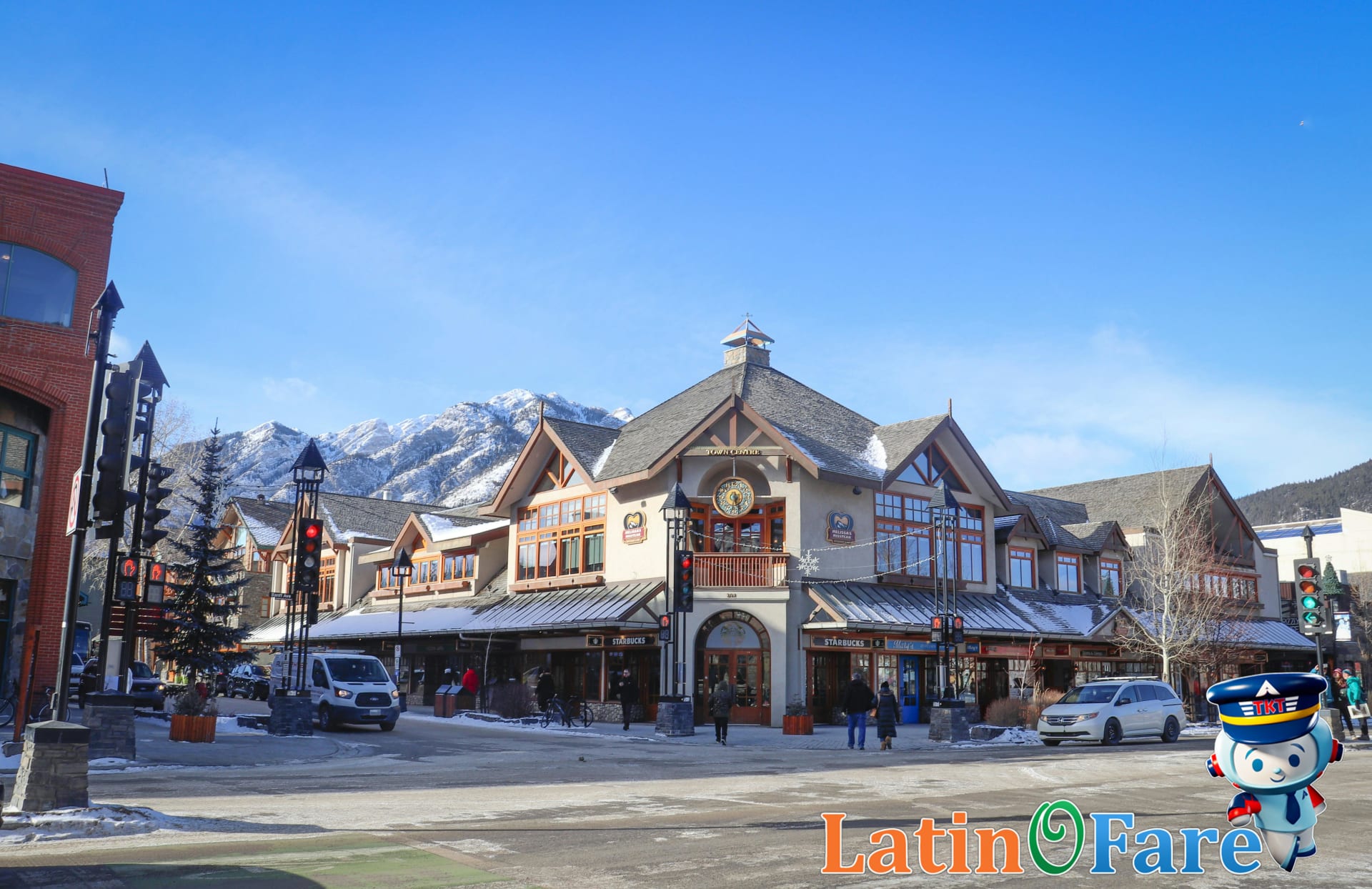 Banff National Park’s main street with mountain view and colorful shops, Canadian Rockies travel