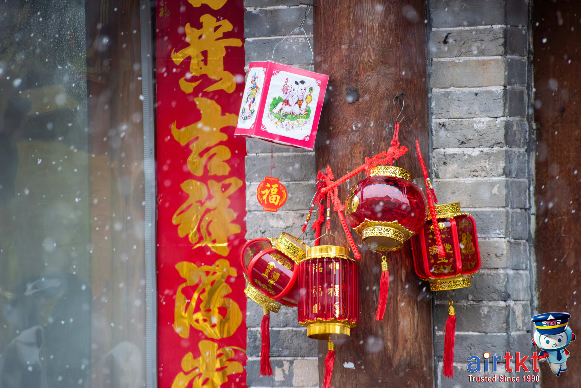 Festive street decorated with red lanterns and banners for Chinese New Year celebrations