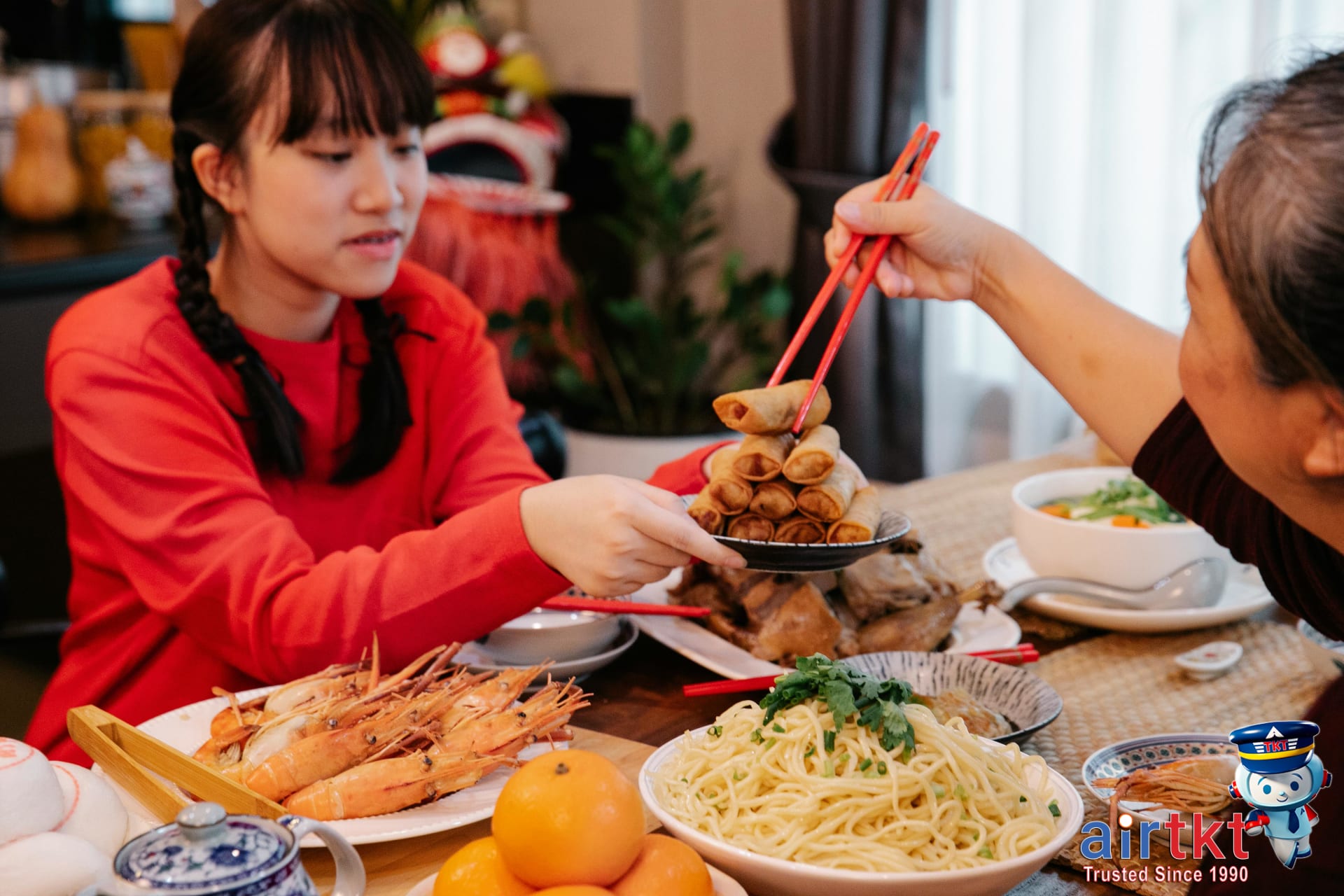 Family reunion dinner with traditional dishes celebrating Lunar New Year traditions