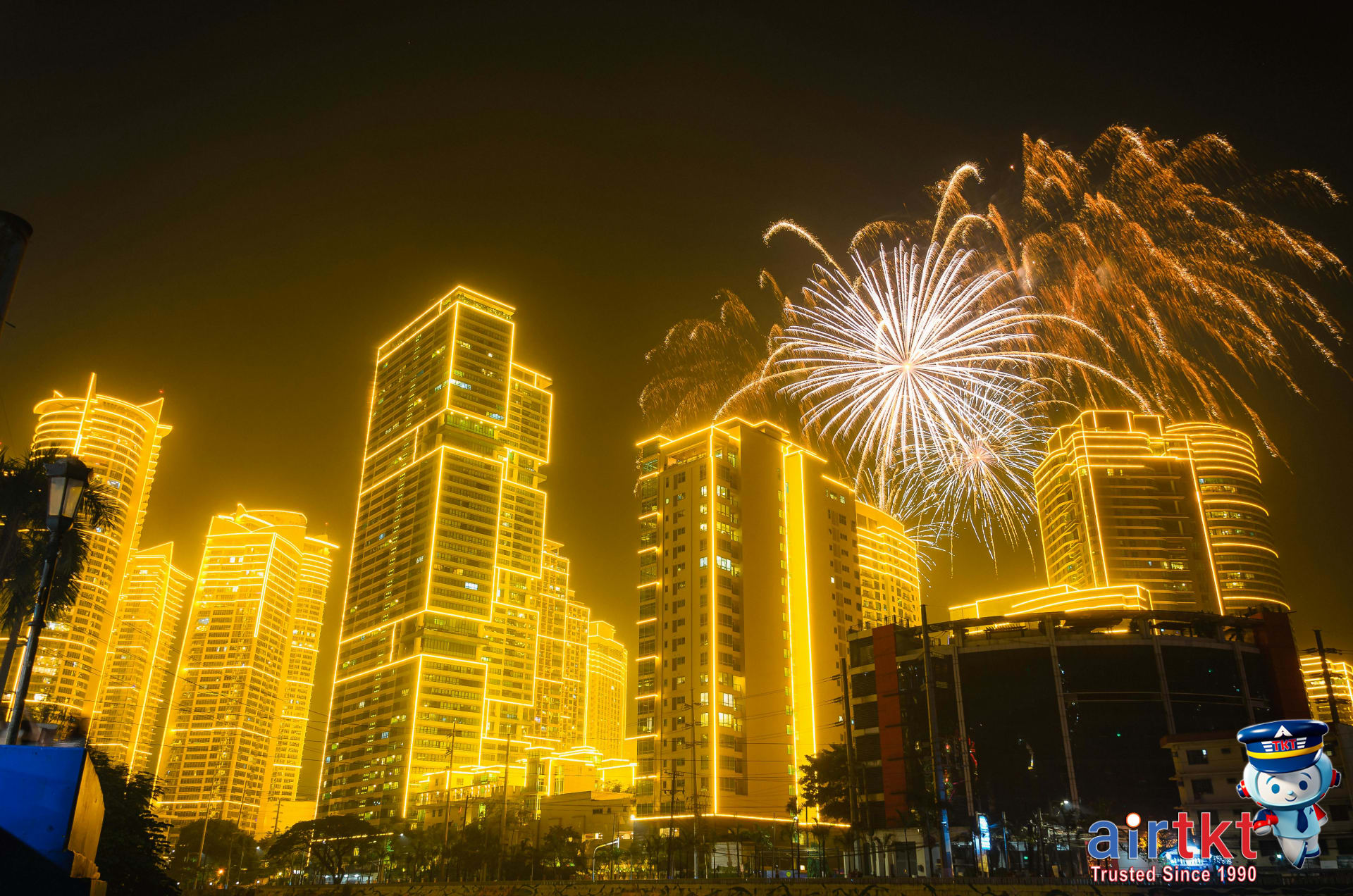 Colorful Lunar New Year fireworks lighting Asian city skyline, festive atmosphere