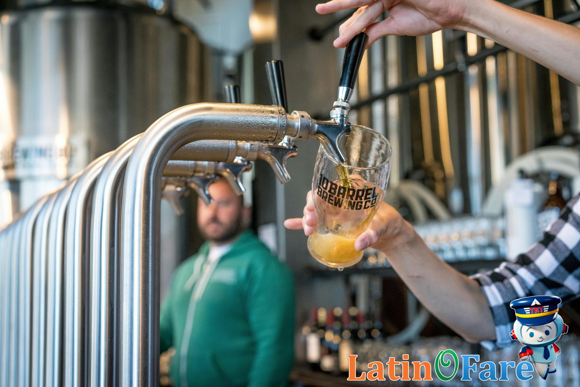 Sampling beer at Milwaukee craft brewery, enjoying signature brew on a weekend trip