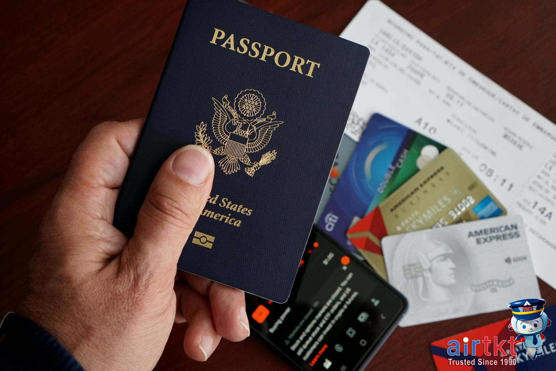 Traveler organizing documents passport receipts for travel insurance claim