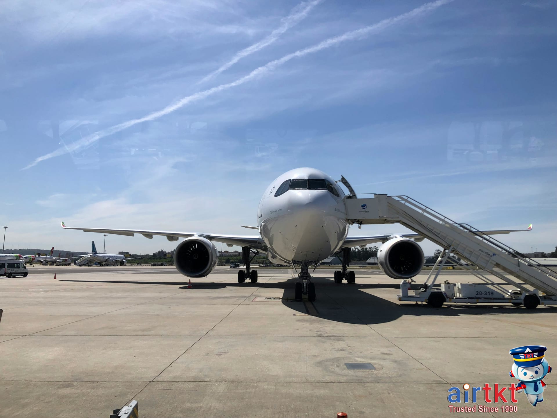 TAP Portugal airplane parked at Lisbon airport with focus on stopover travel options