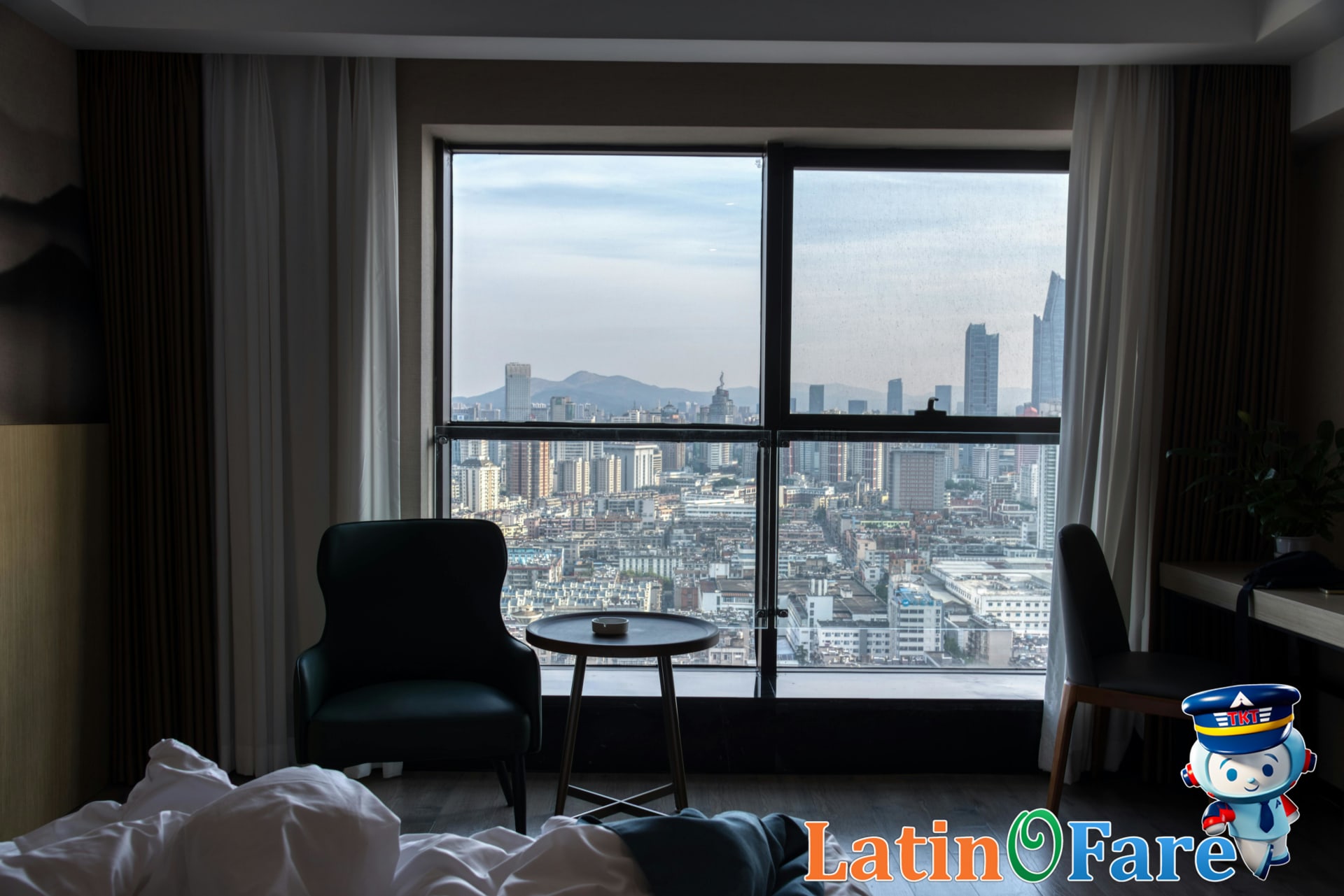 Airport hotel room amenities, soundproof windows, city view, relevant to comfort for travelers