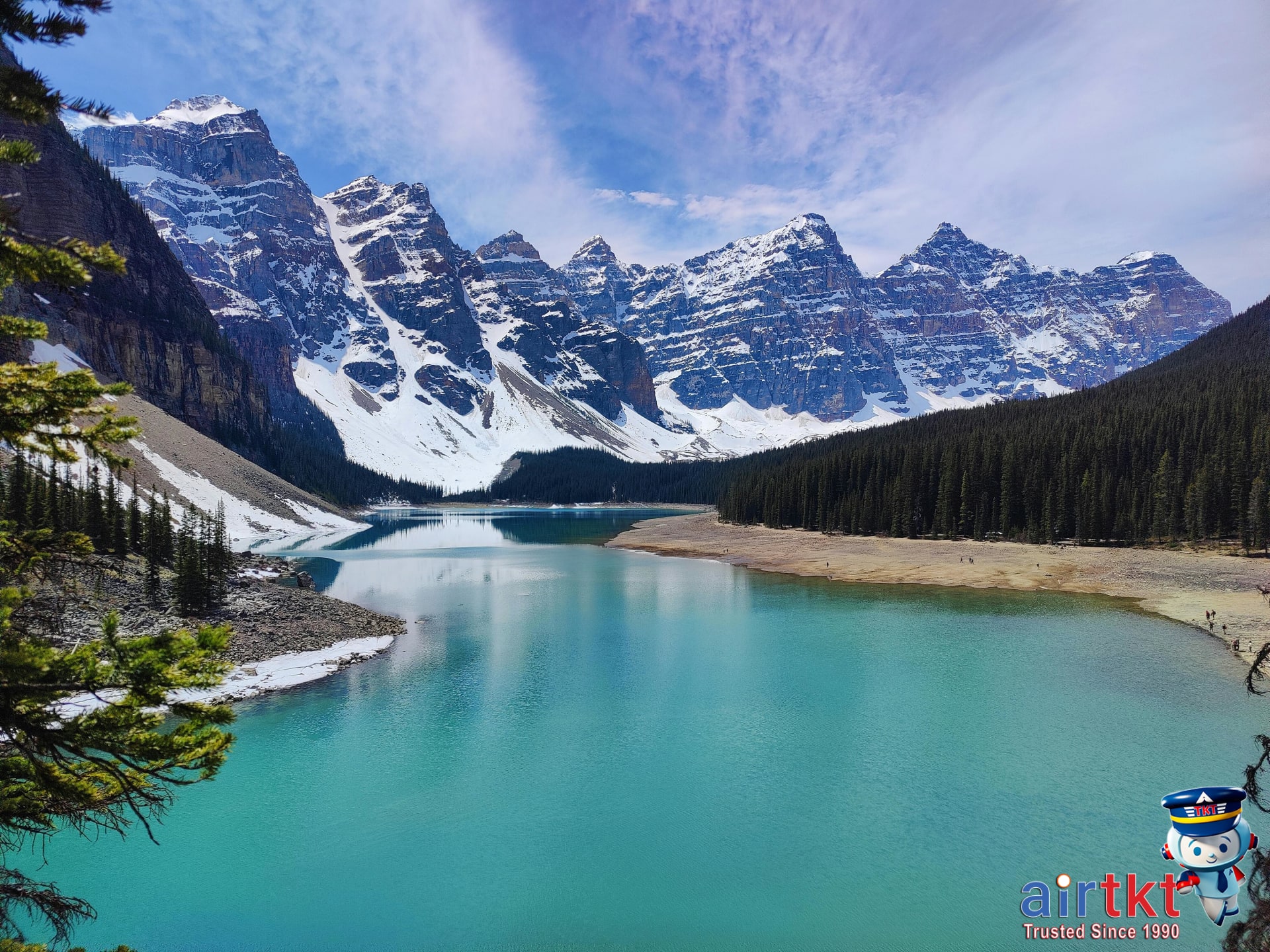 Moraine Lake turquoise water and mountain peaks in Banff National Park