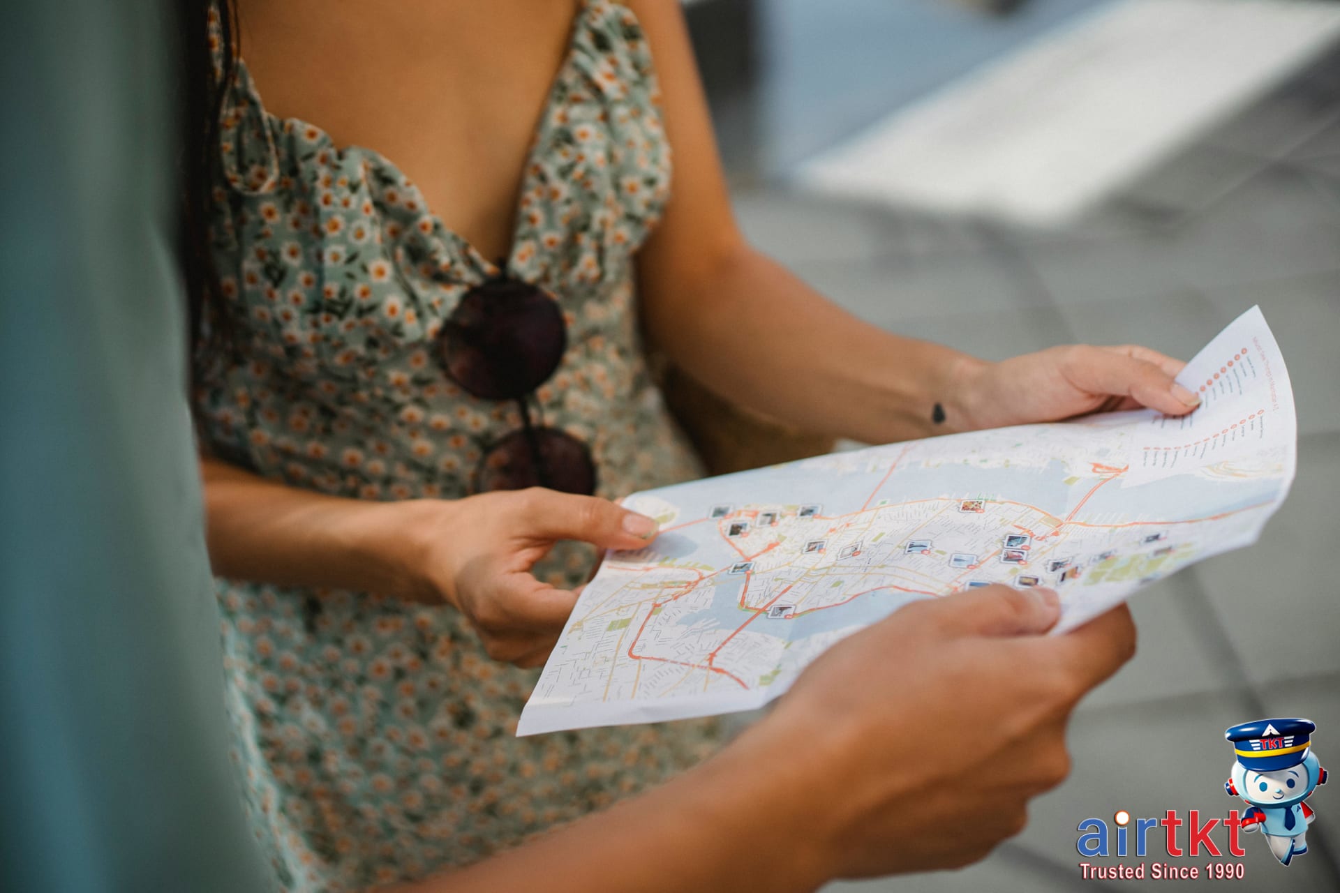 Couple travelers consulting city map to explore destination effectively