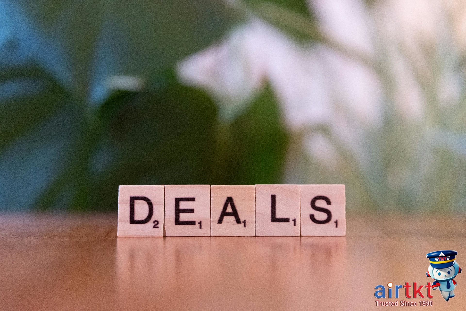 Mobile app displaying travel deals and discounted fares on screen