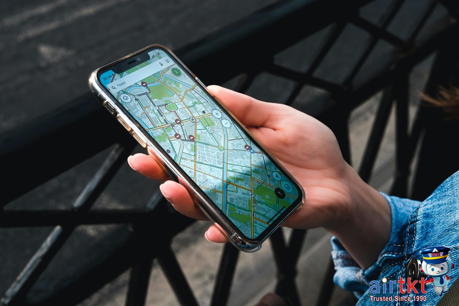 GPS navigation app guiding traveler in unfamiliar city with clear street map