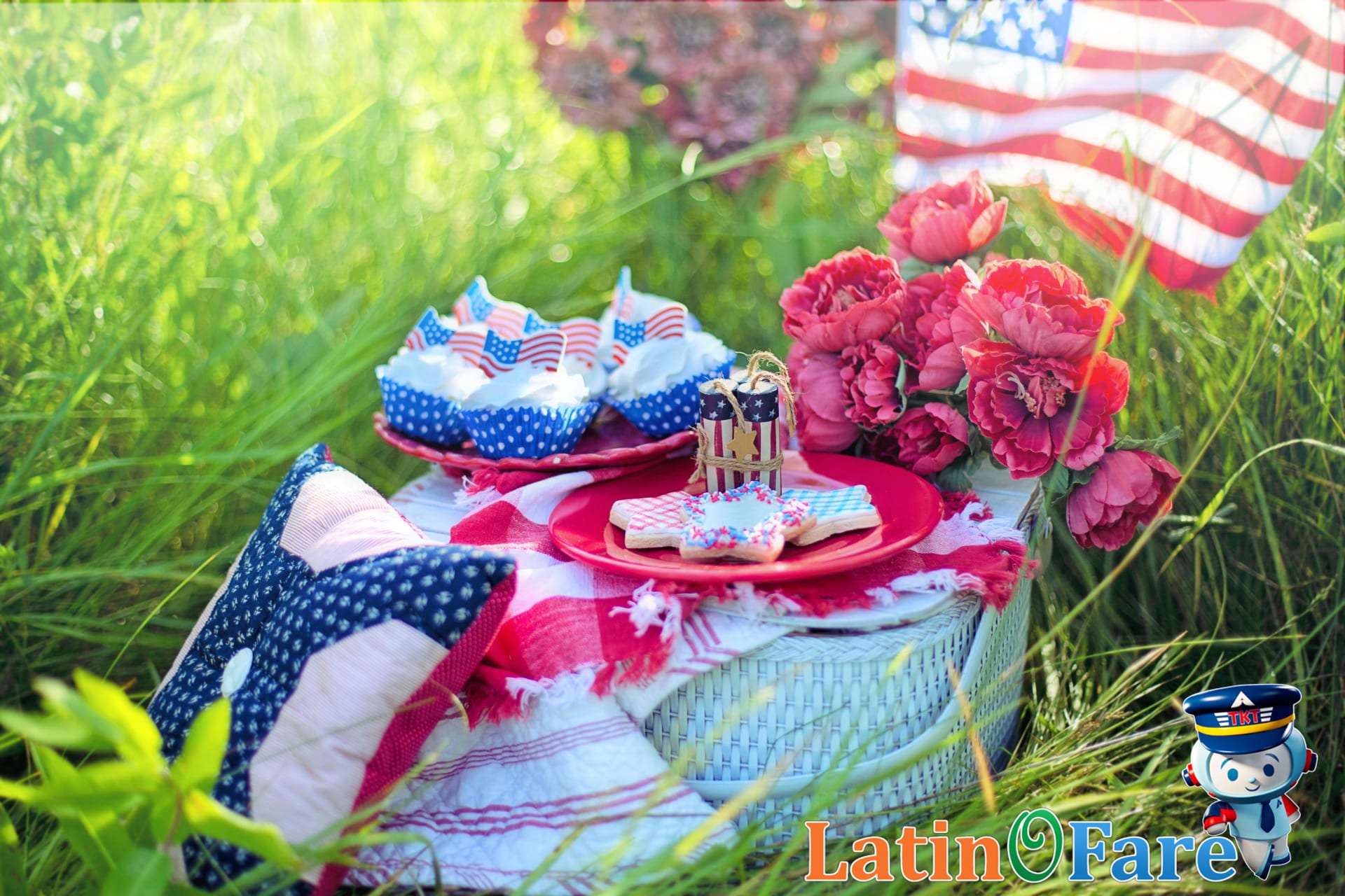 Family enjoying a picnic with US flag napkins during a Flag Day themed road trip.