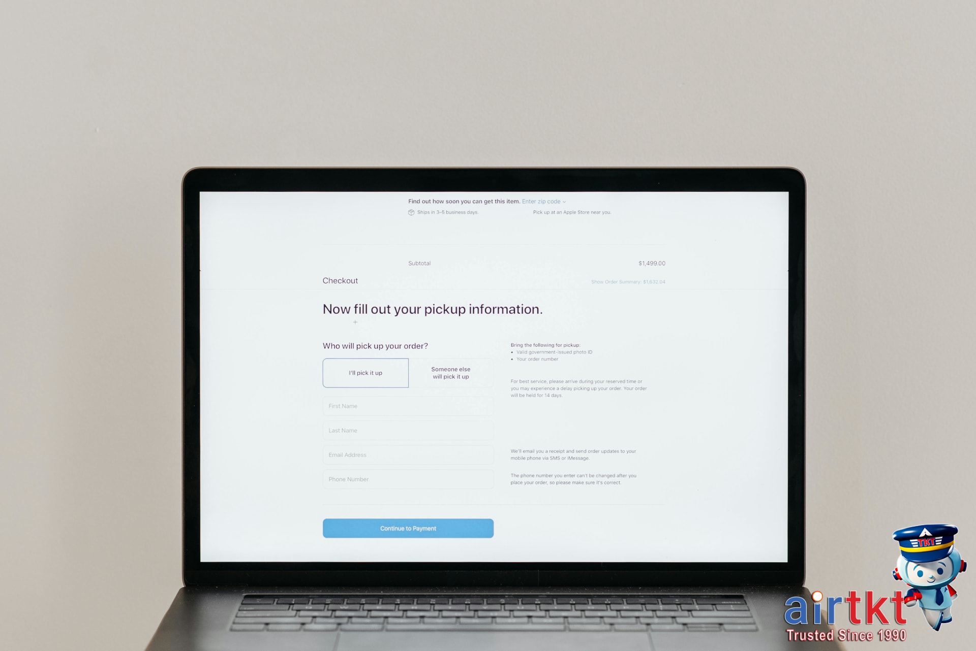 Finding cheap travel deals on AirTkt flight booking website on laptop