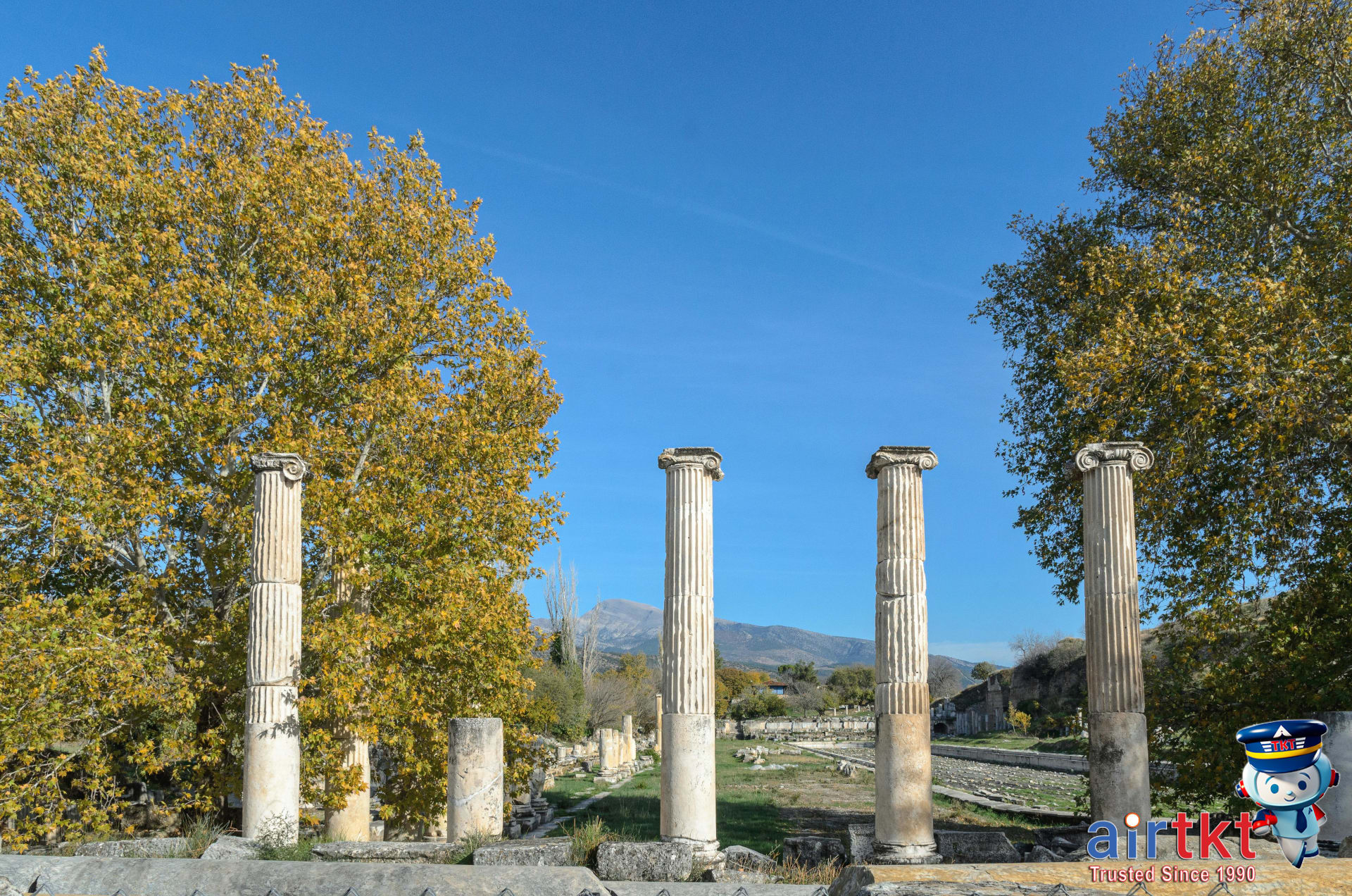 Shoulder season travel with fewer tourists at historic site with ancient ruins