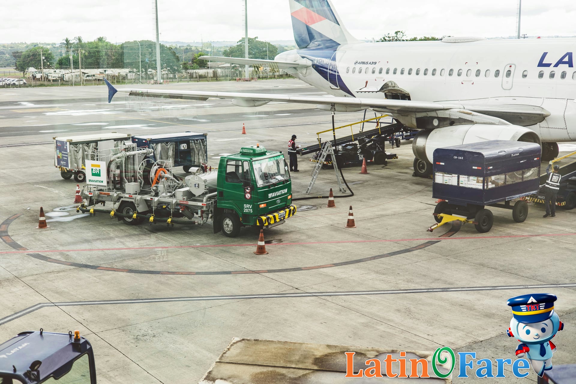 LATAM Airlines staff greeting travelers at a South American airport on departure day