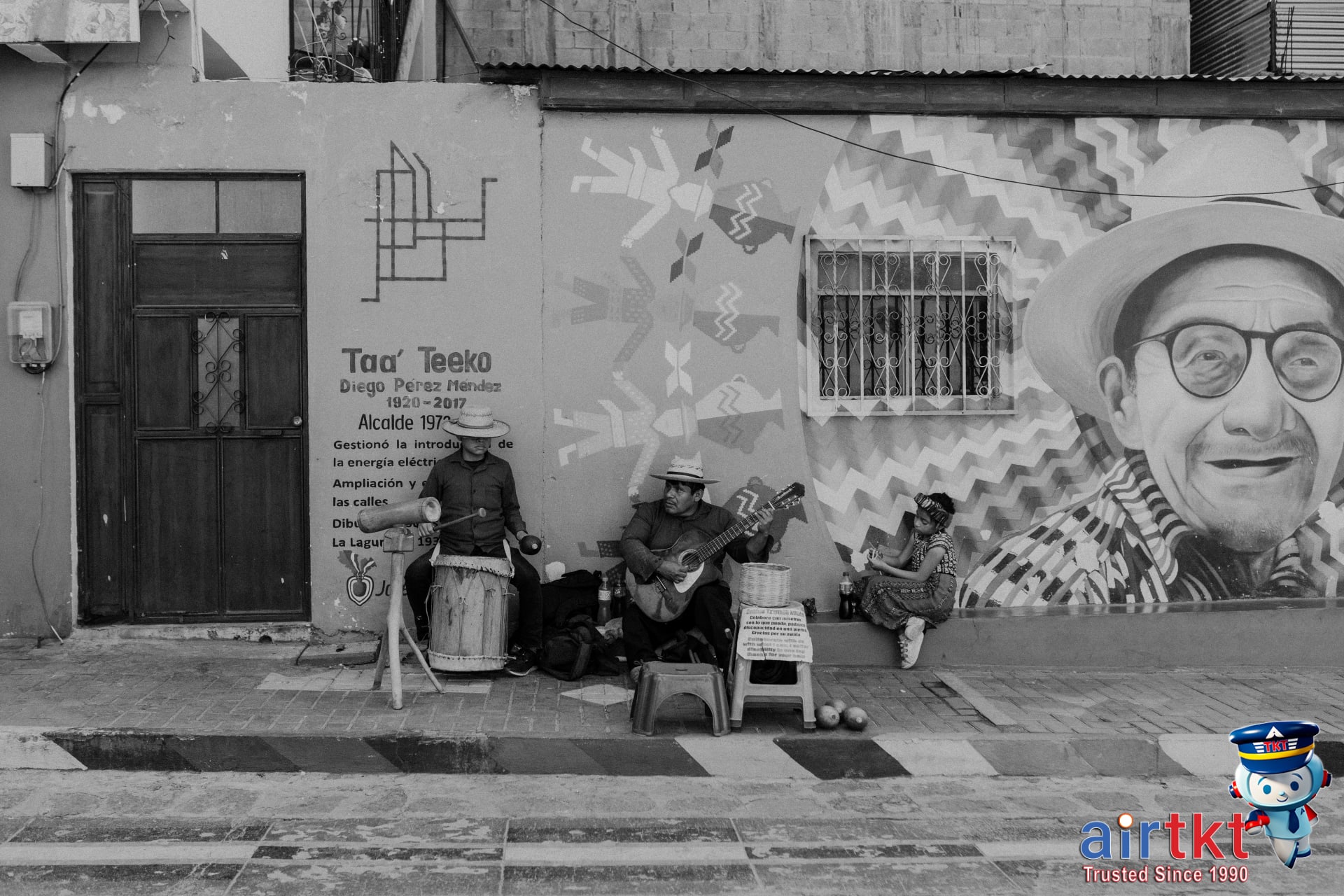 Street musicians and murals in Miami Little Havana with colorful Cuban-inspired artwork