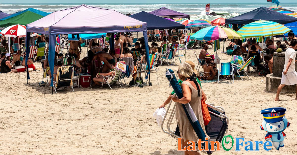 Memorial Day beachgoers relaxing under umbrellas for summer kickoff travel
