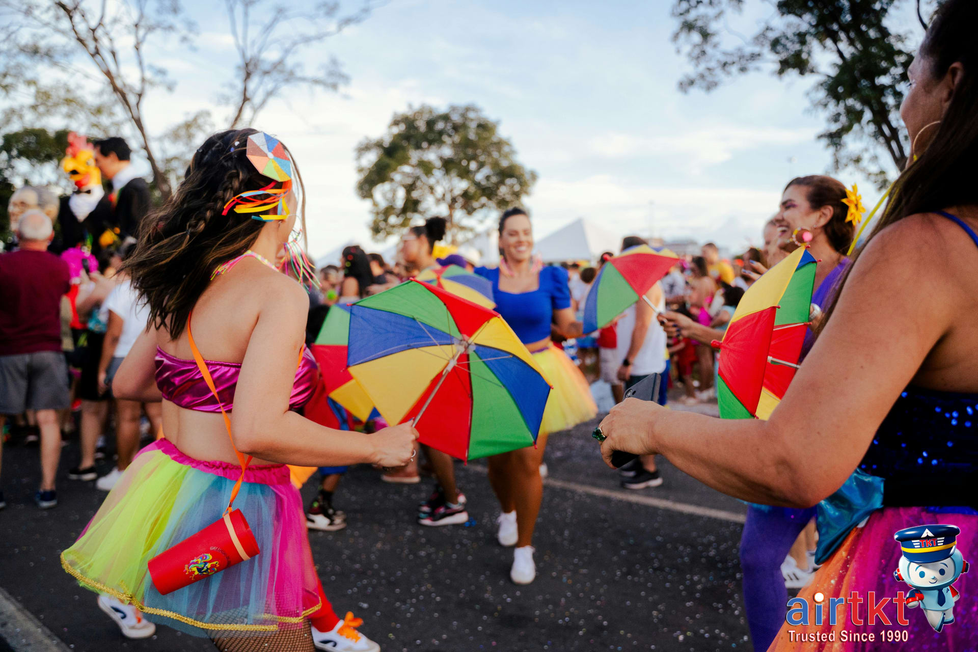 Travelers packing costumes and essentials for Rio Carnival trip preparation