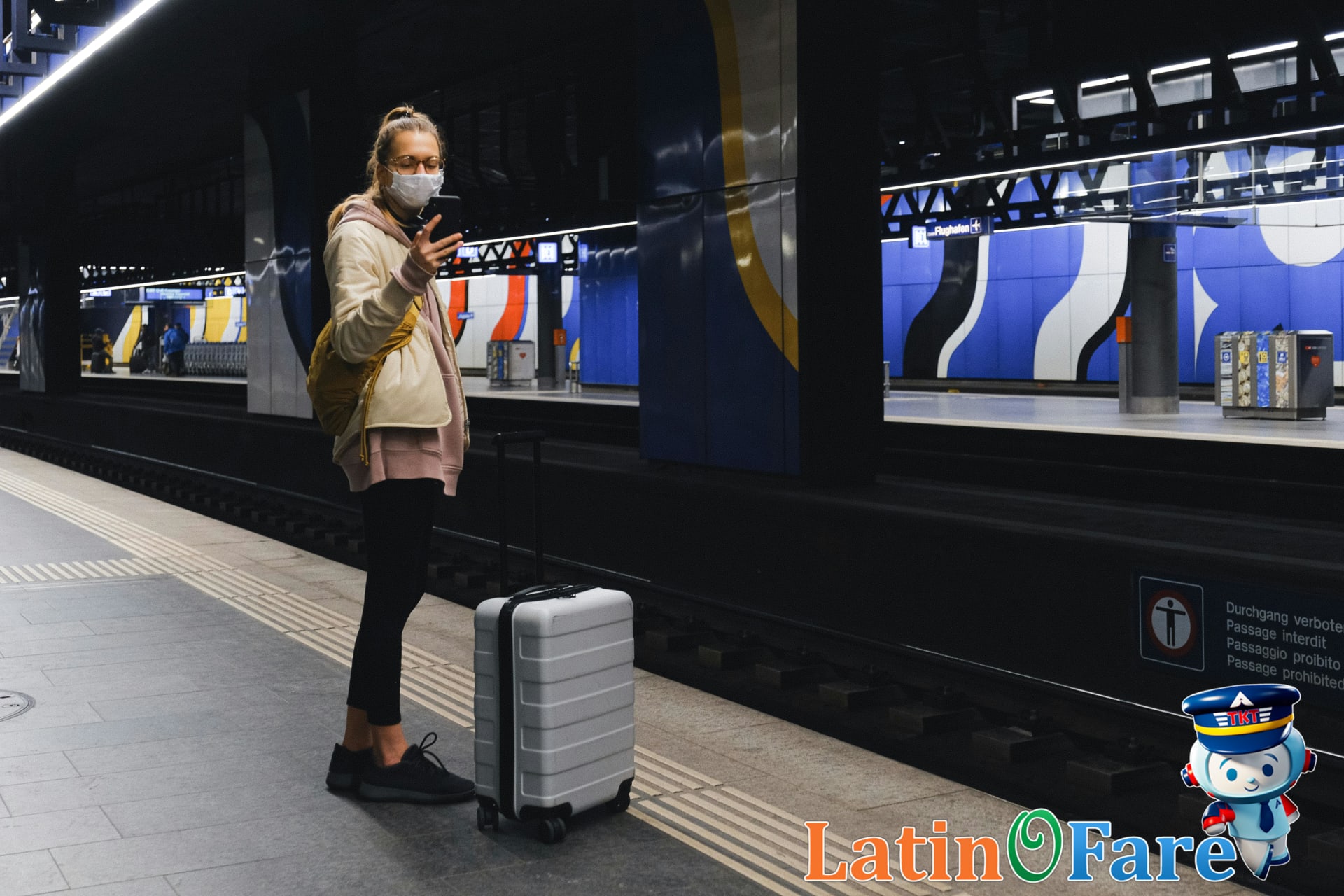 Boarding the train with luggage for airport trip using public transit.