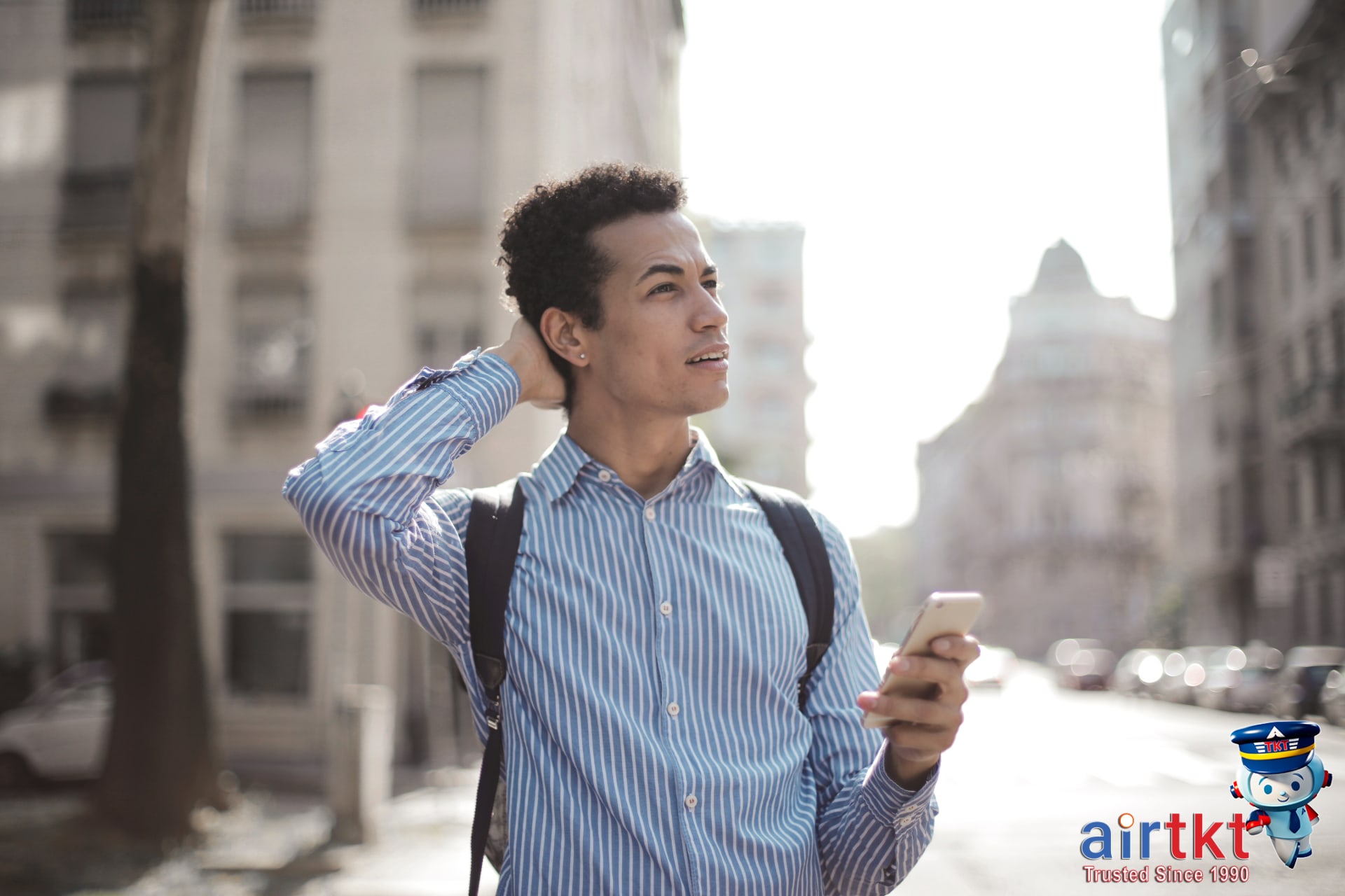 Traveler outdoors reviewing translation app for accuracy and recognizing its limitations