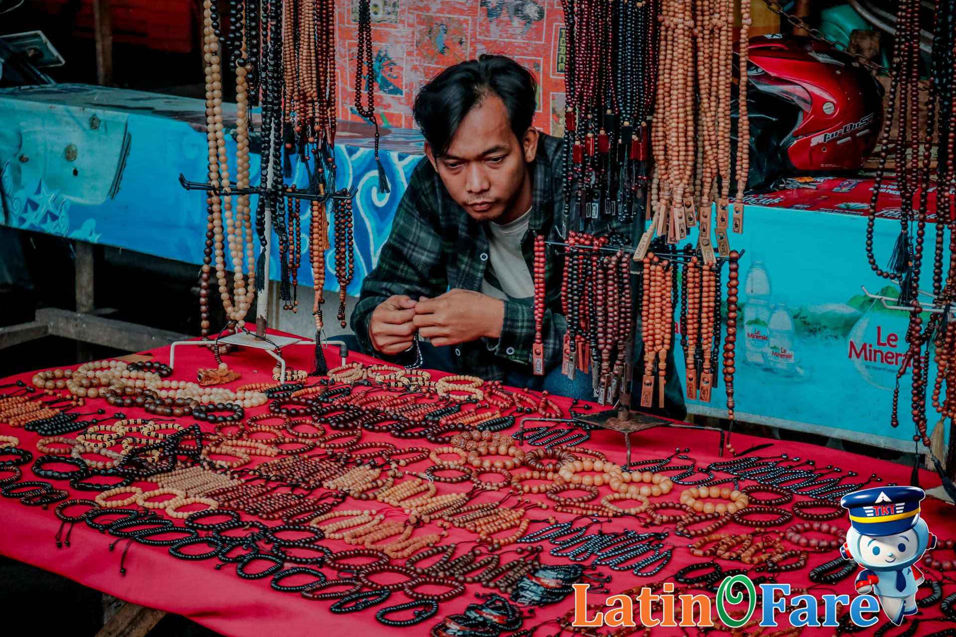 Vendor tries to offer a friendship bracelet, a common tourist scam for travelers worldwide.