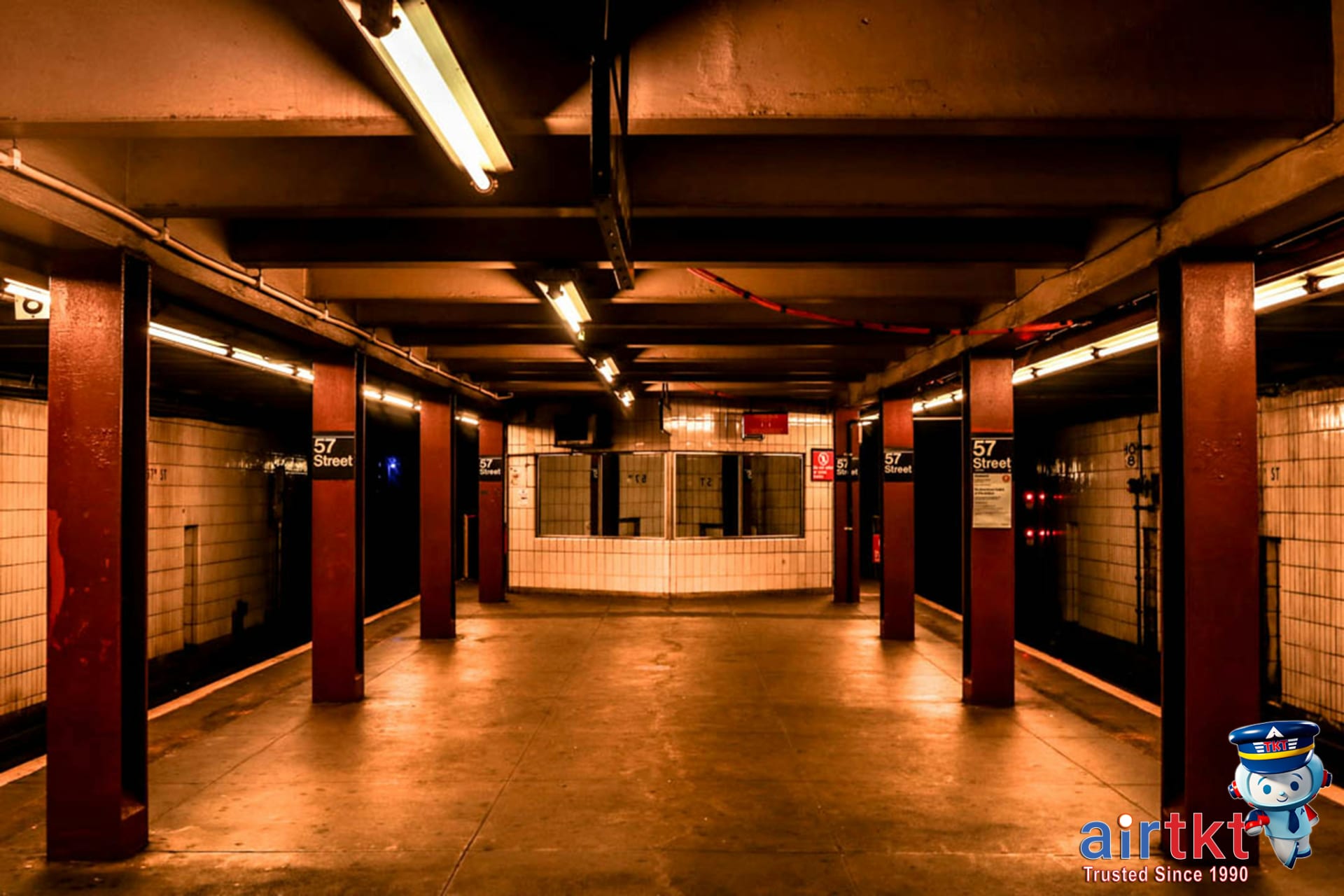 Well-lit clean NYC subway station at night for safe travel and transit safety
