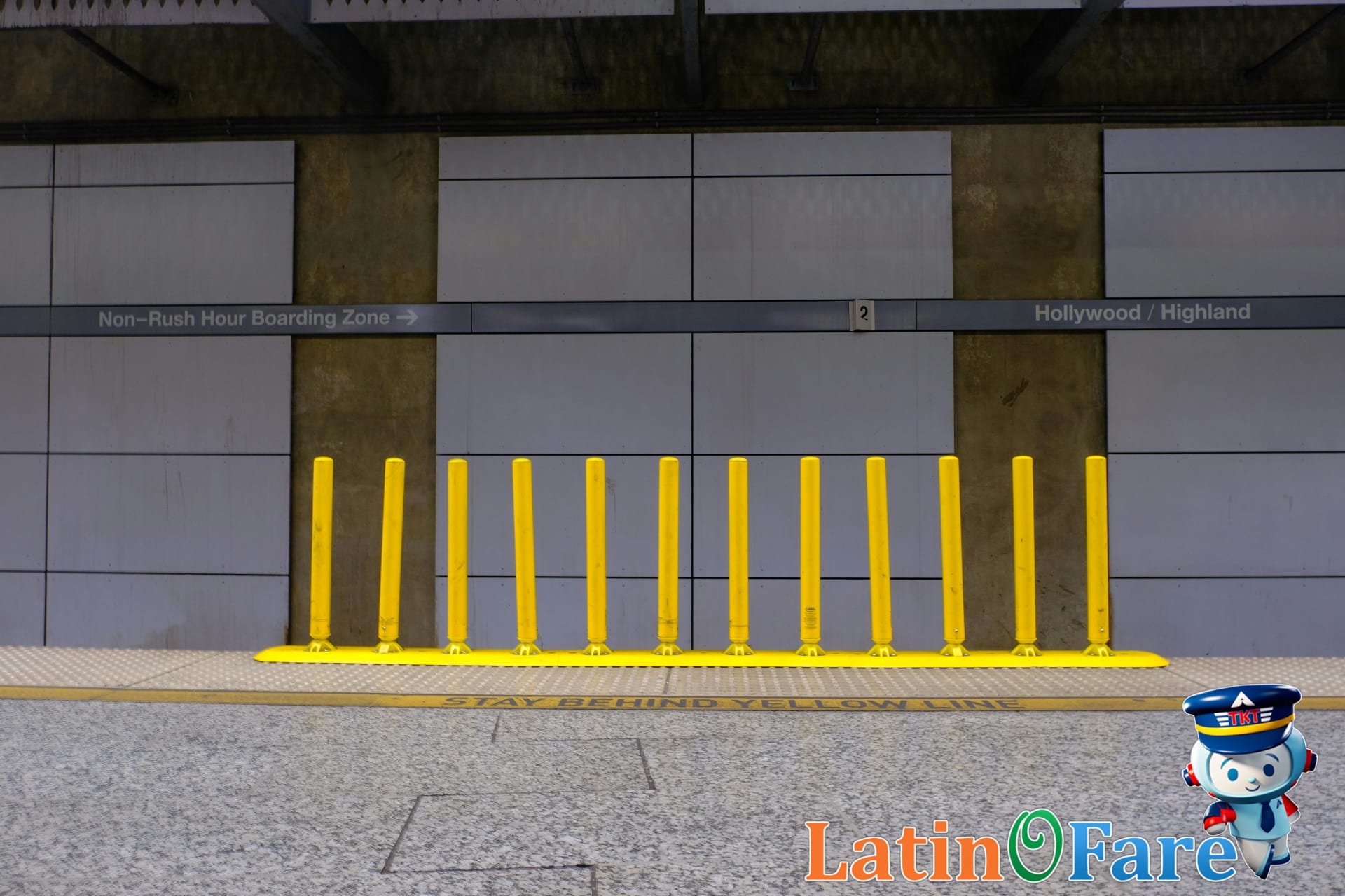Travelers using Los Angeles Metro station information kiosk to plan LA public transit routes.