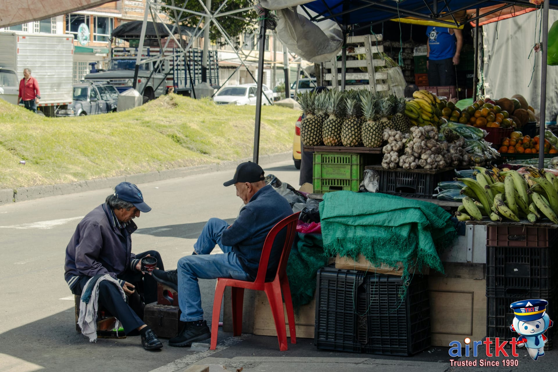 Street vendors in affordable travel destination markets showcasing low-cost options