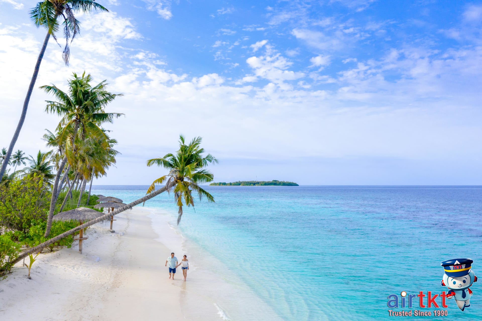 Relaxed budget travelers at an affordable scenic beach destination enjoying the view