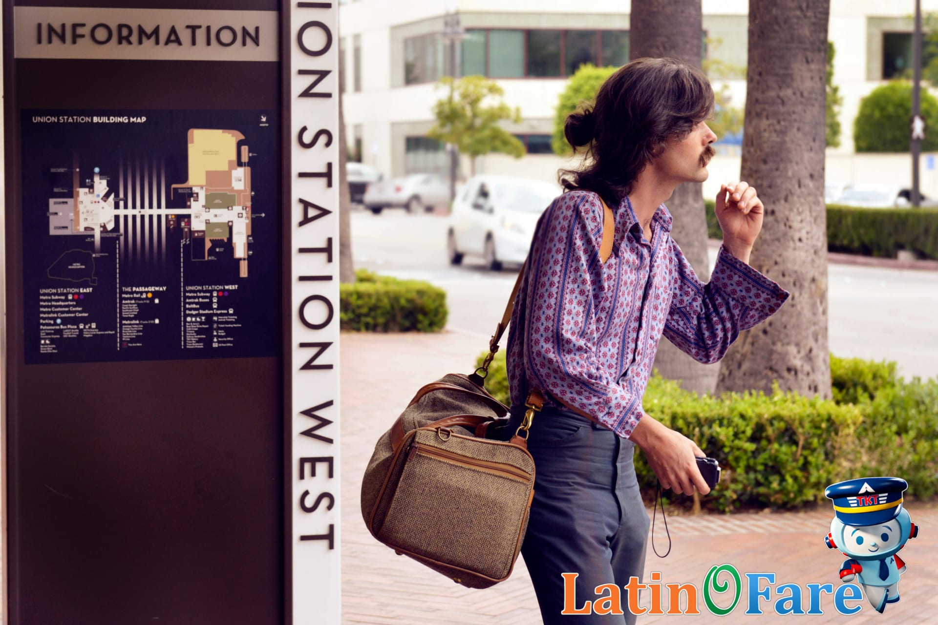 Travelers navigating Los Angeles Union Station for Metro and bus transfer planning.