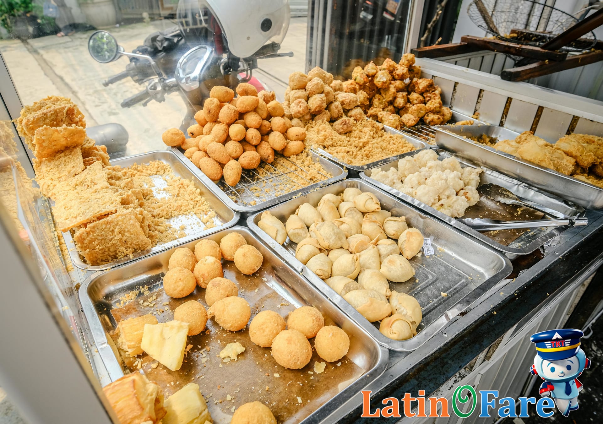 Travelers dining at local street food stall, affordable meals while traveling internationally.