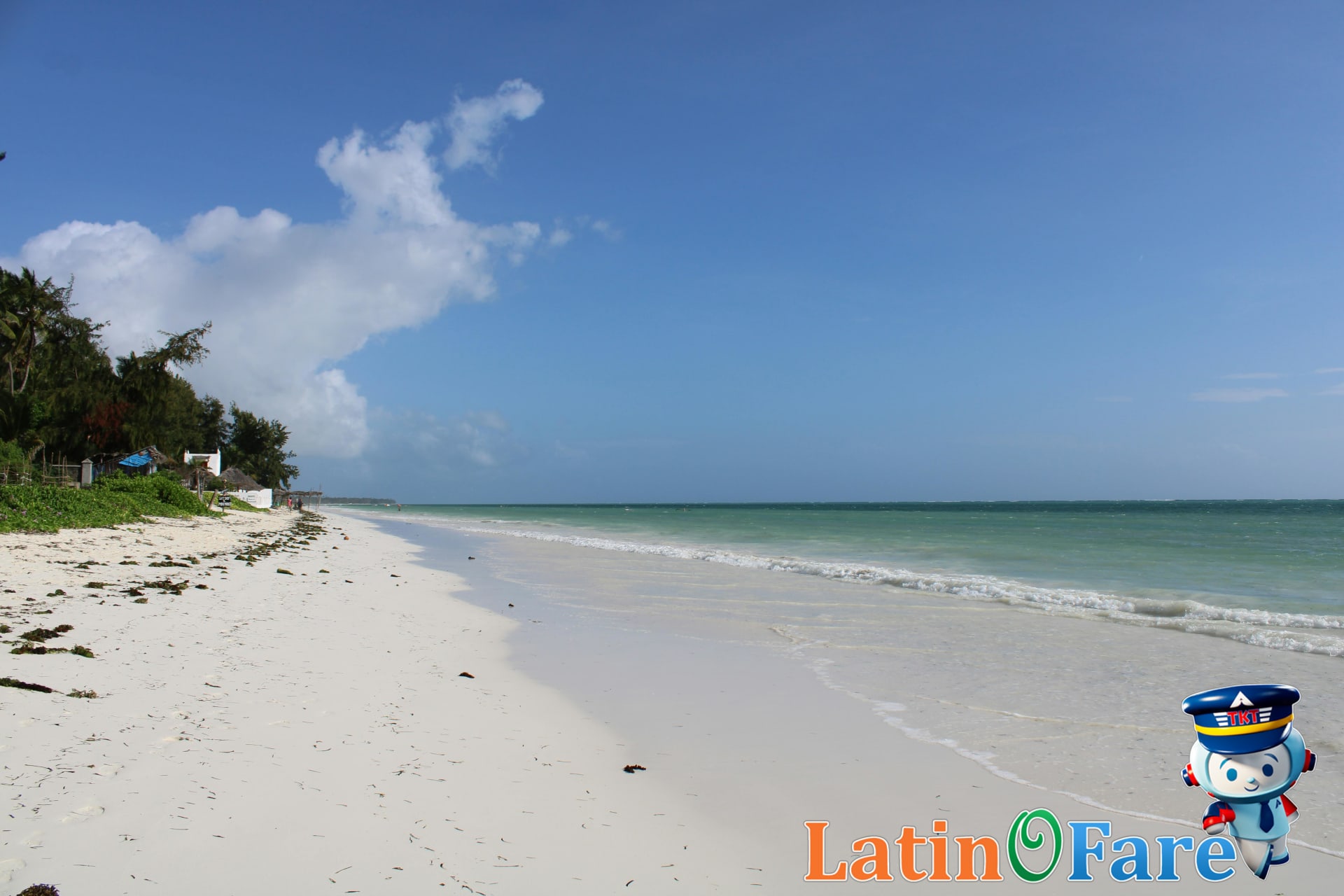Affordable African beach in Zanzibar, travelers relaxing on a stunning low-cost holiday