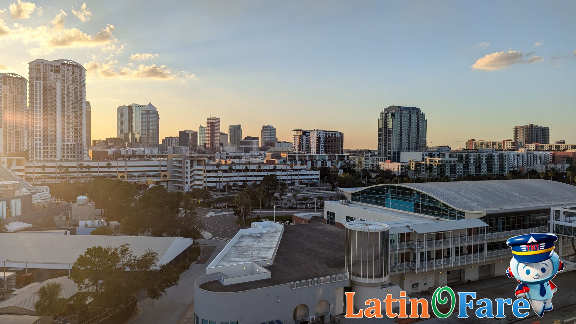 Sunset over Tampa Riverwalk with people enjoying budget-friendly waterfront activities