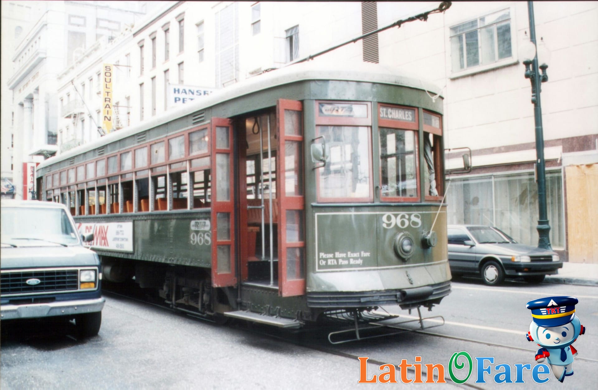 Historic Ybor City streetcar rolling past old buildings in Tampa, Florida