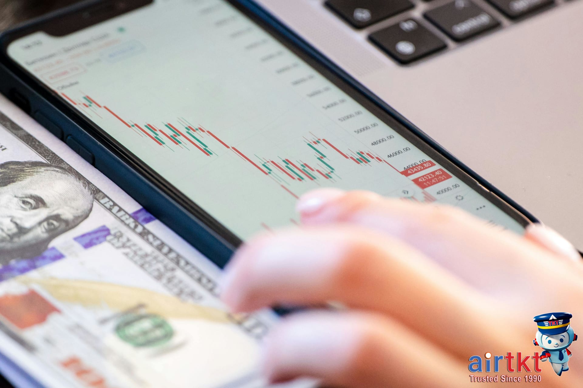 Researching currency exchange FAQs for travel on smartphone