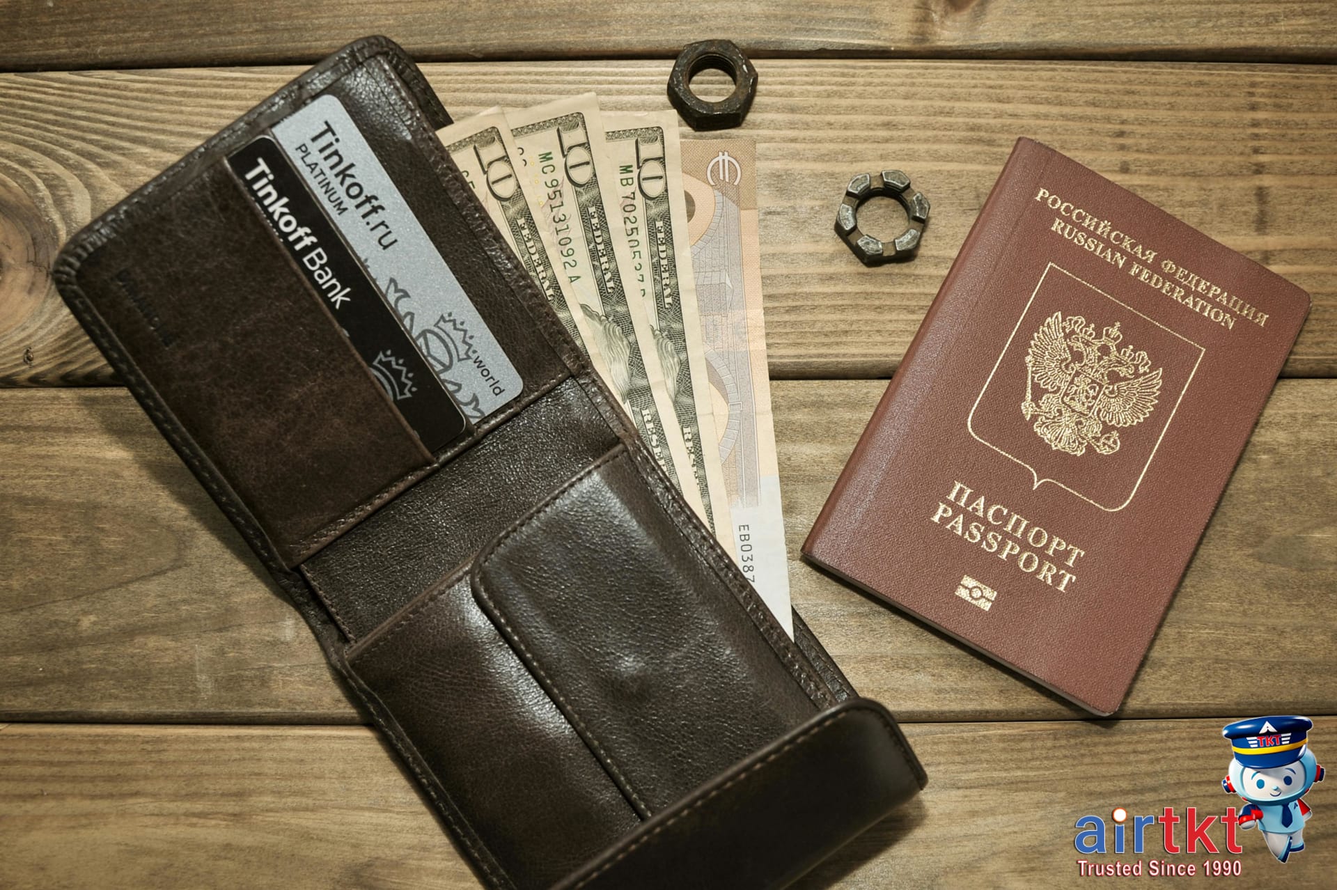 Organized travel wallet for currency exchange planning with notes and cards
