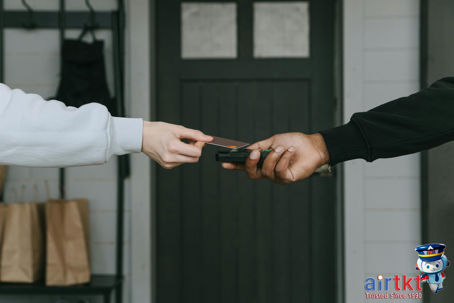 Credit card avoiding hidden currency exchange fees near payment terminal