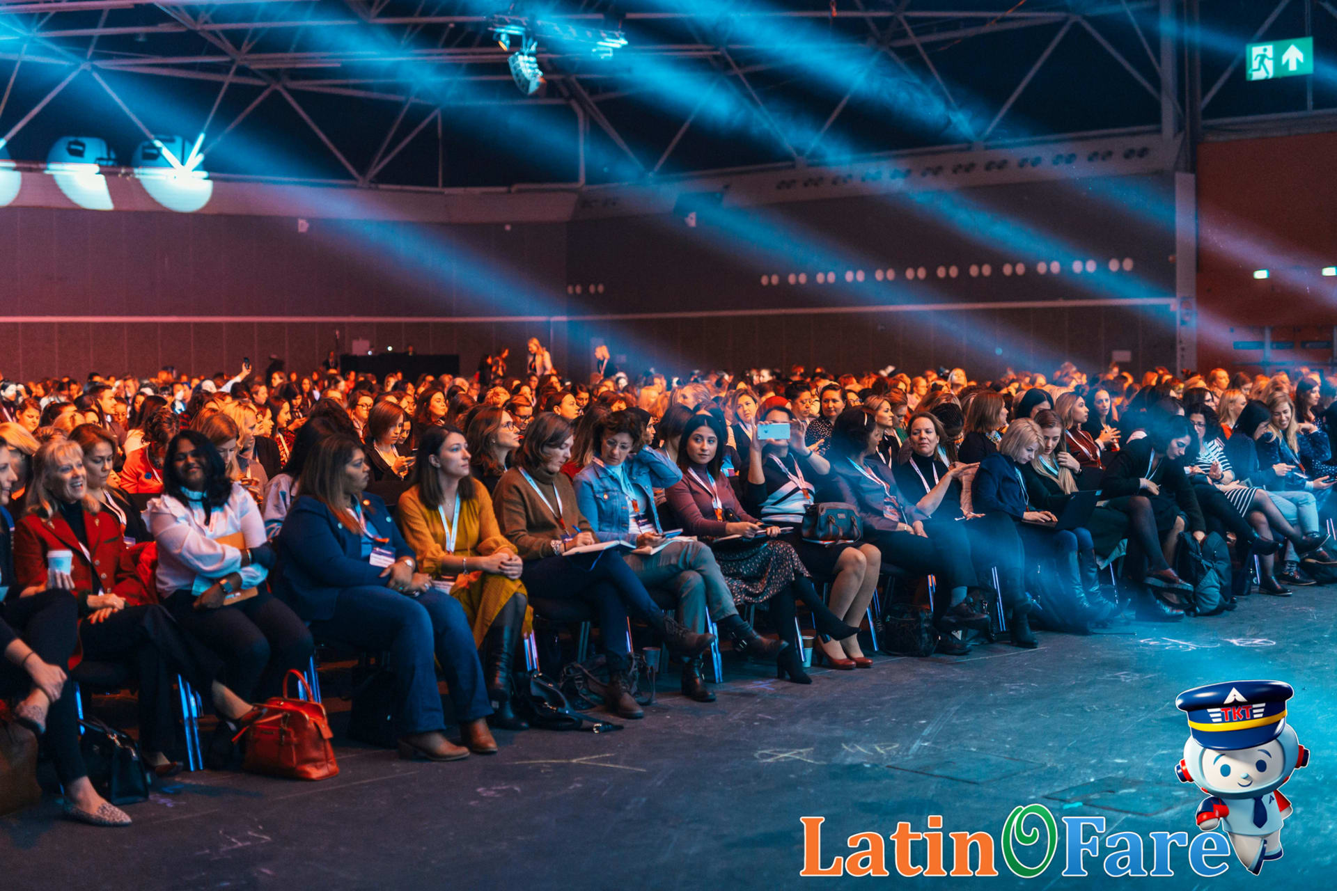 Audience at SXSW tech presentation in Austin, discovering festival innovations and interactive panels.