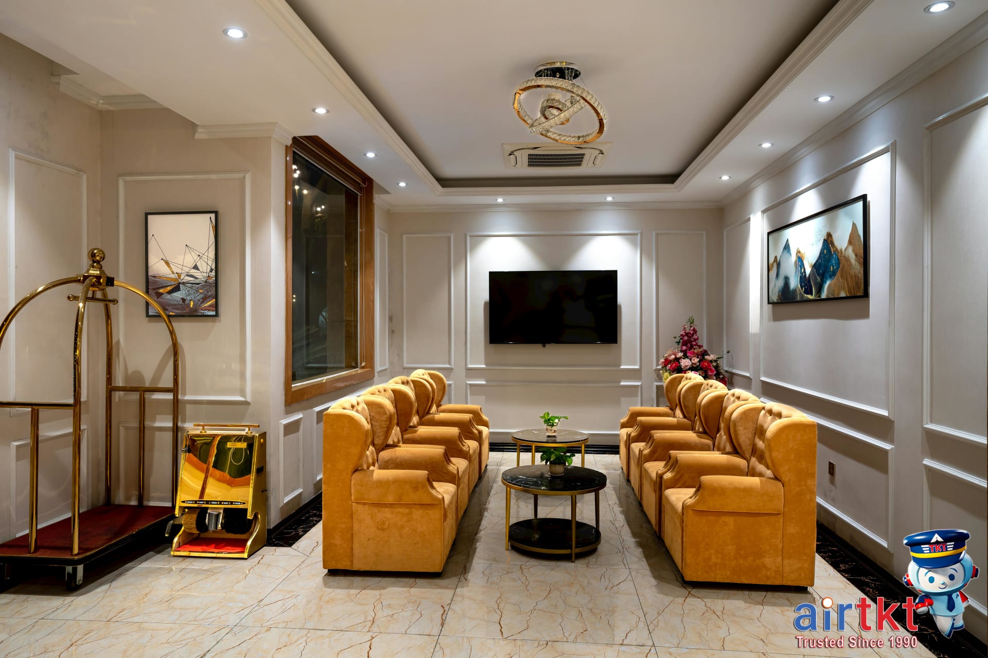 Hotel lobby showcasing various room types and elegant armchairs for free night redemption