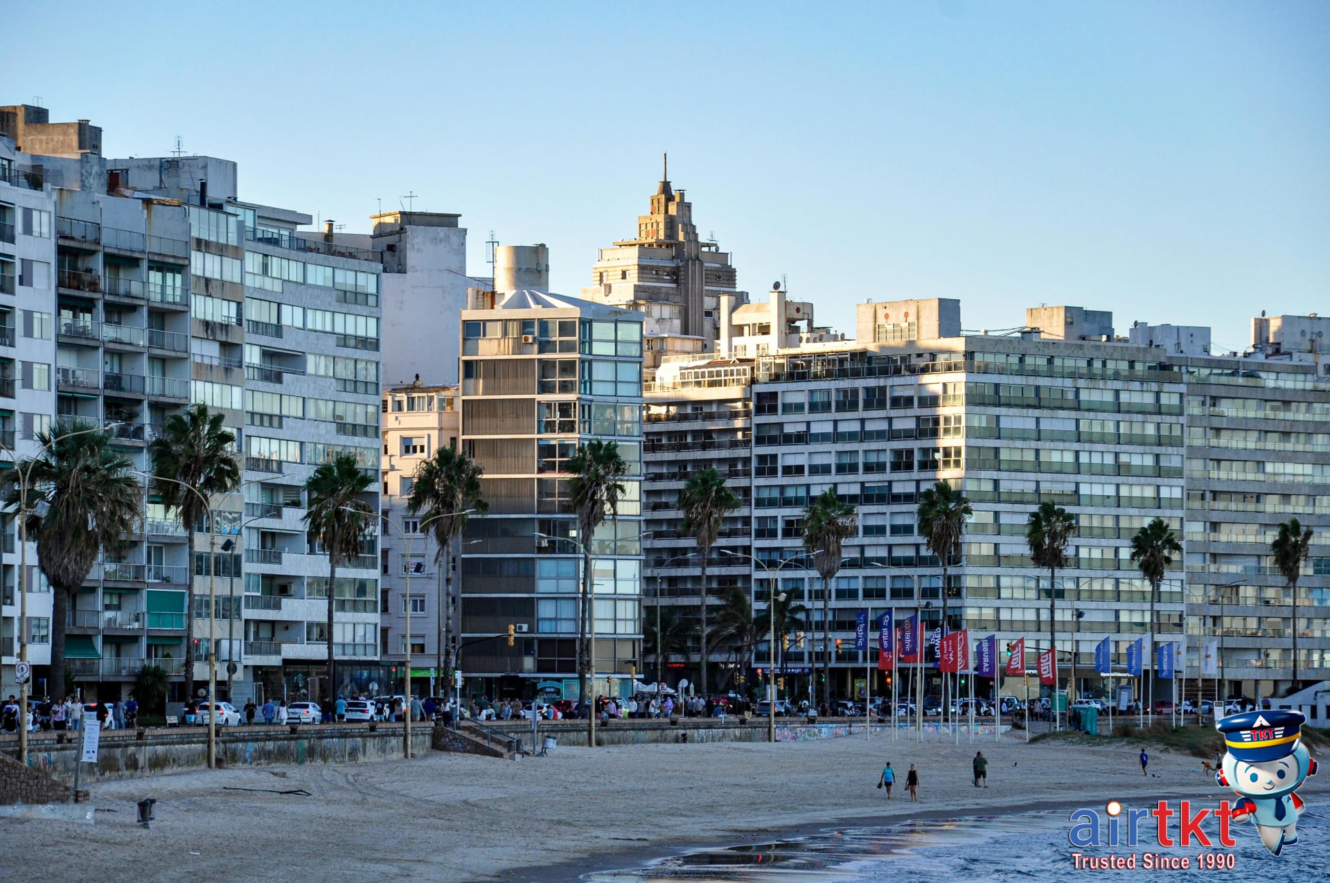 Playa Pocitos beach with sunbathers and swimmers in Montevideo