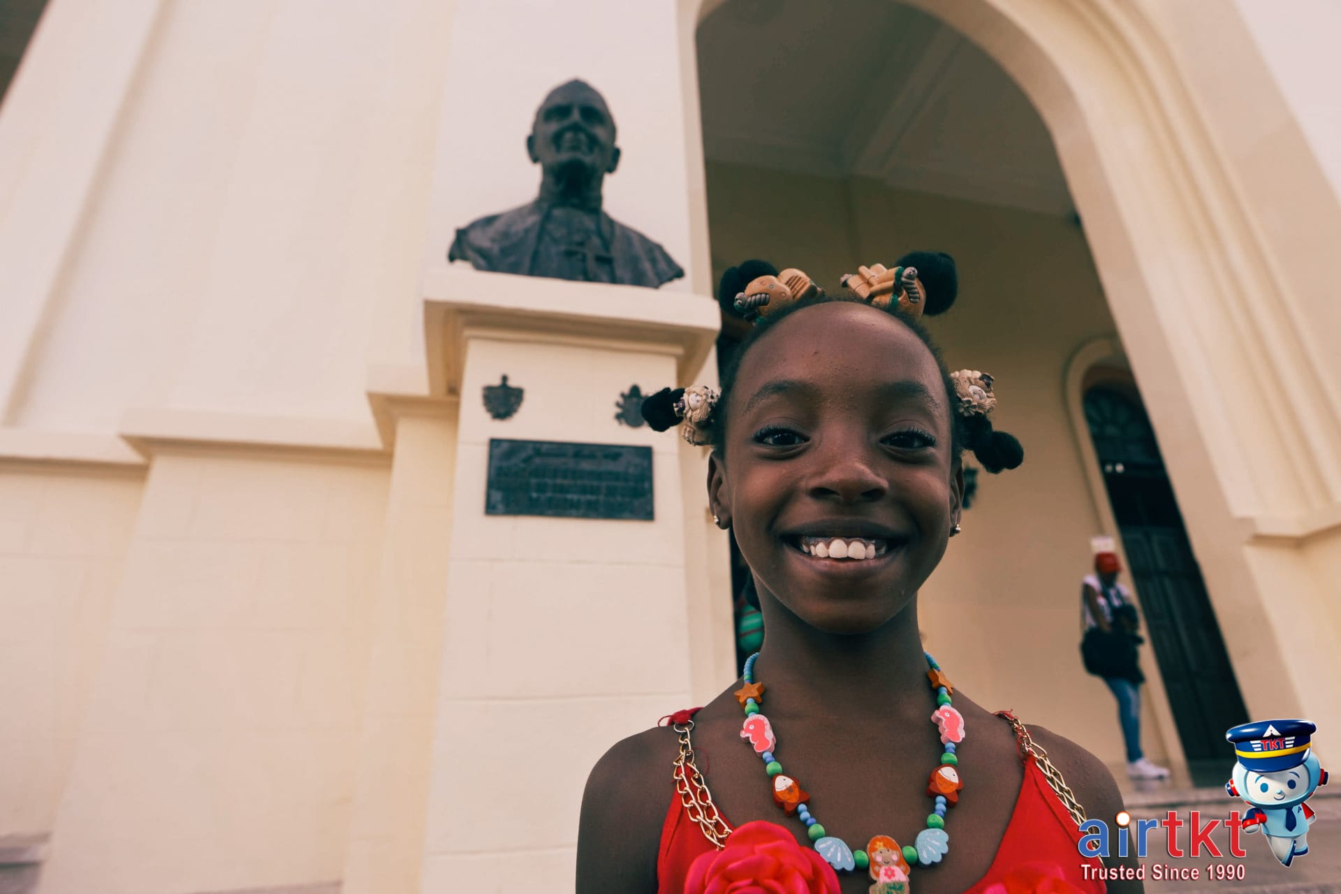Happy traveler enjoying African-American culture on Juneteenth holiday.