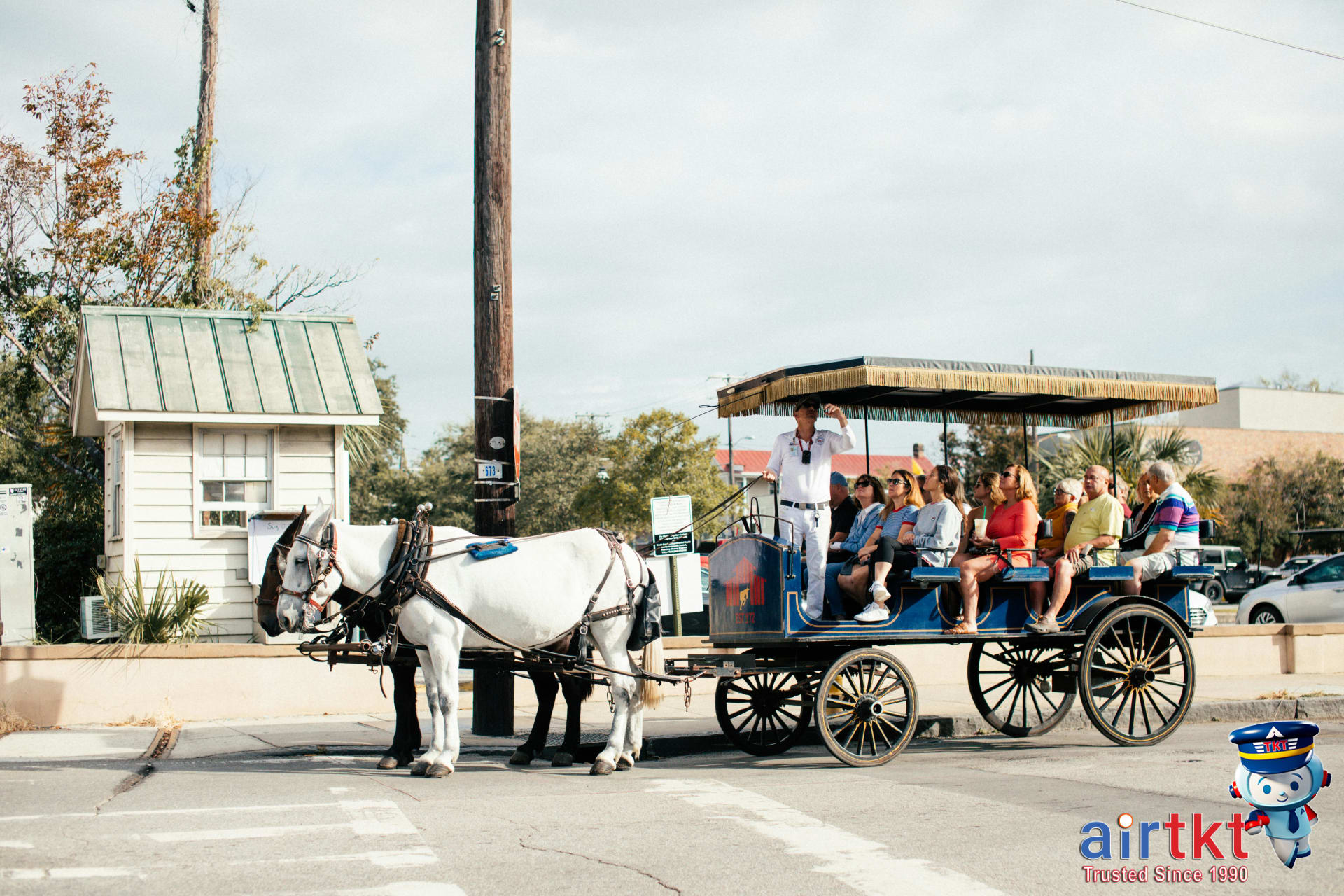 Tour group exploring historic Juneteenth landmark on guided outdoor tour.