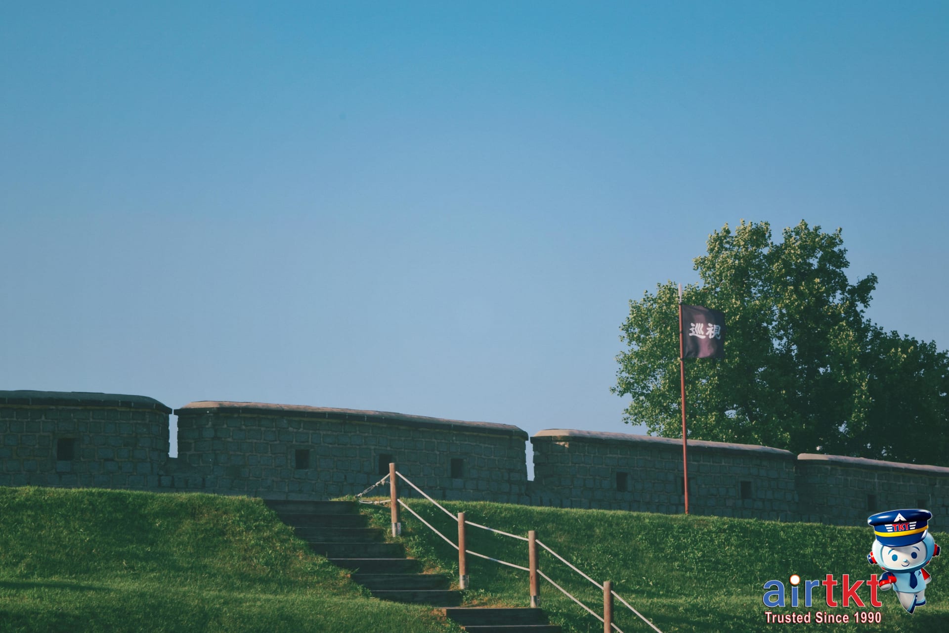 Juneteenth flag flying at a historic African-American heritage site.