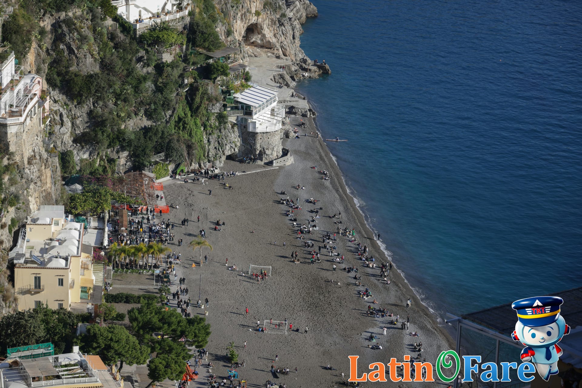 Amalfi Coast beach in Italy with cliffs, pastel towns and Mediterranean shore in summer.