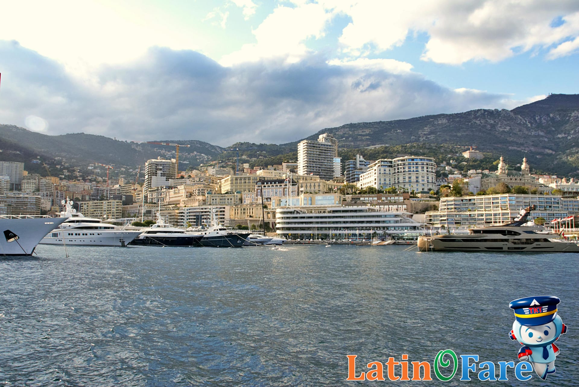 French Riviera luxury Mediterranean beach with umbrellas and yachts, popular summer destination in Europe.