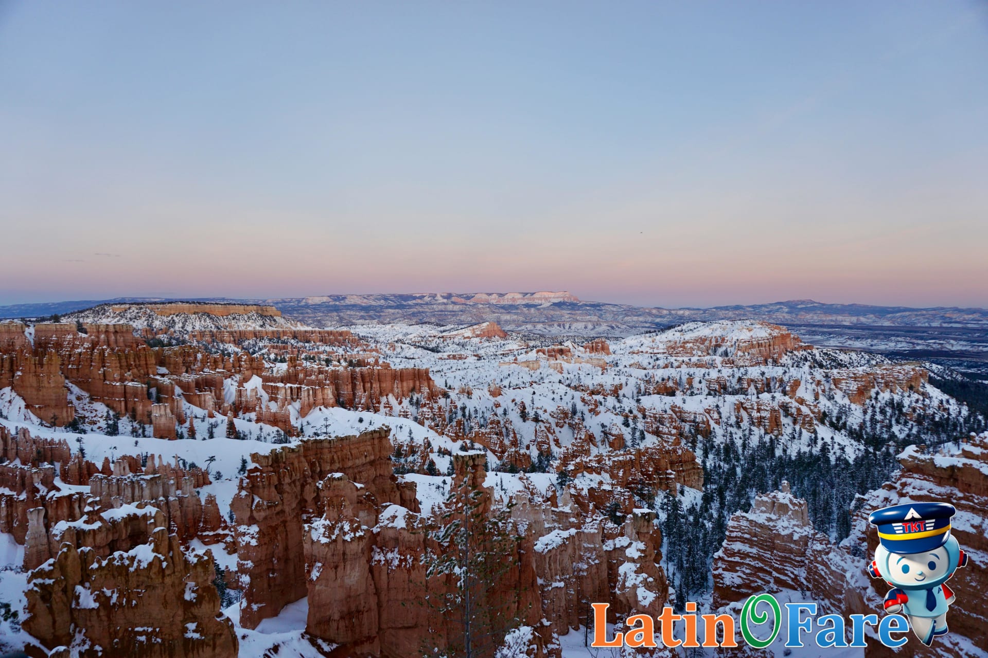 Sunrise over hoodoo formations in Bryce Canyon on a Utah national parks road trip