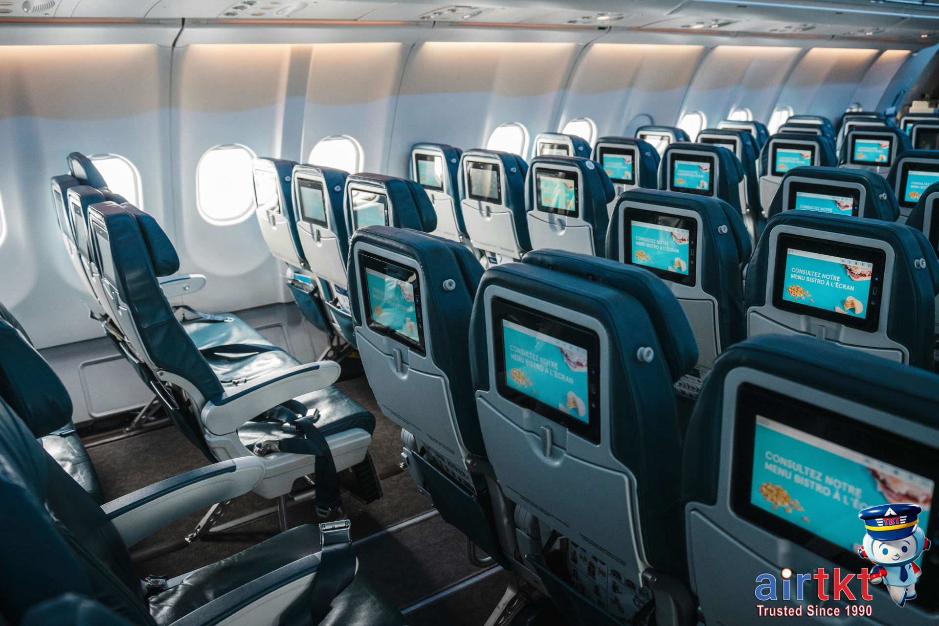 Full-service airline premium cabin with spacious seating and amenities, highlighting travel comfort